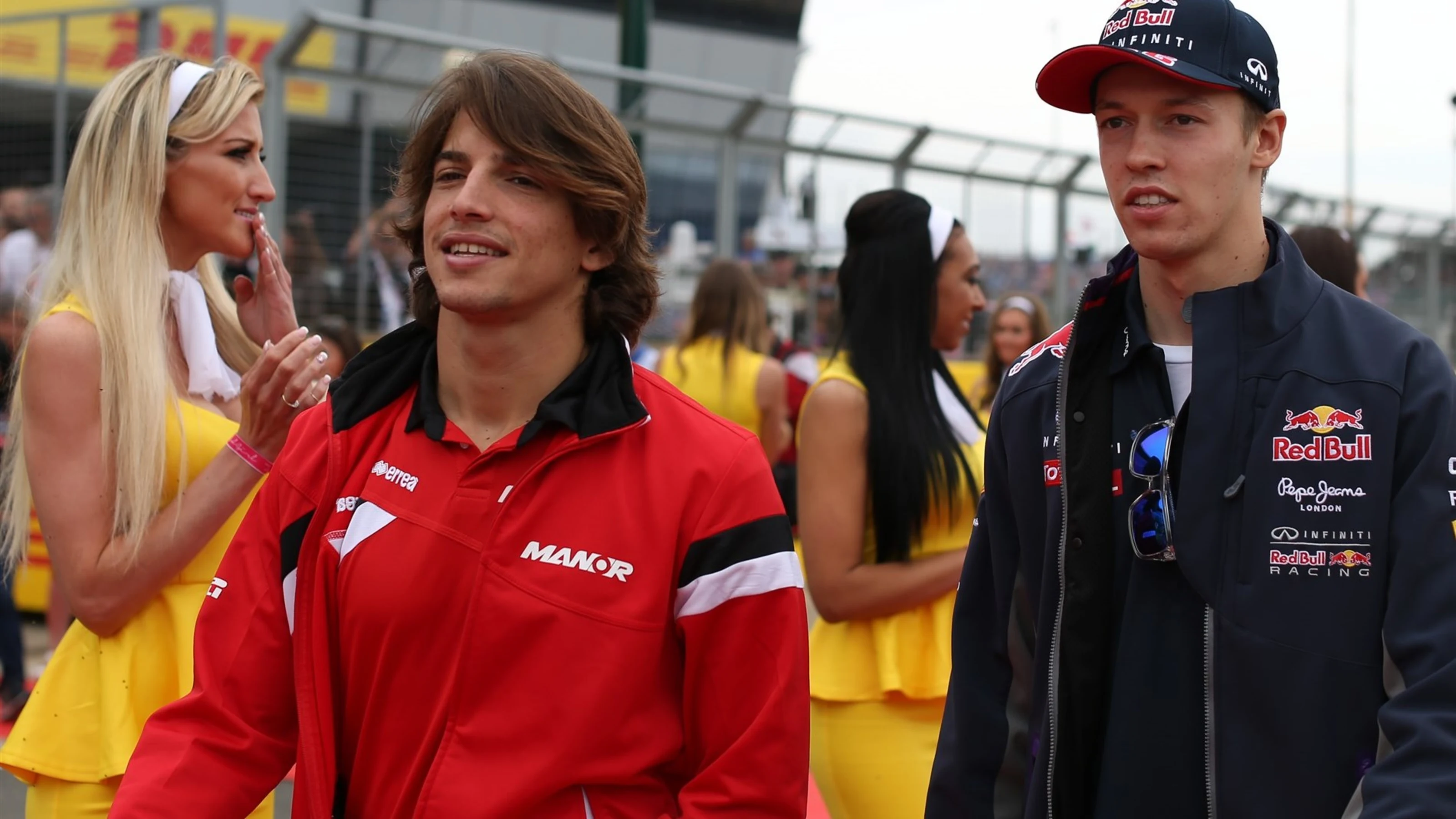 Roberto Merhi (ESP) Manor GP and Daniil Kvyat (RUS) Red Bull Racing at the drivers parade at