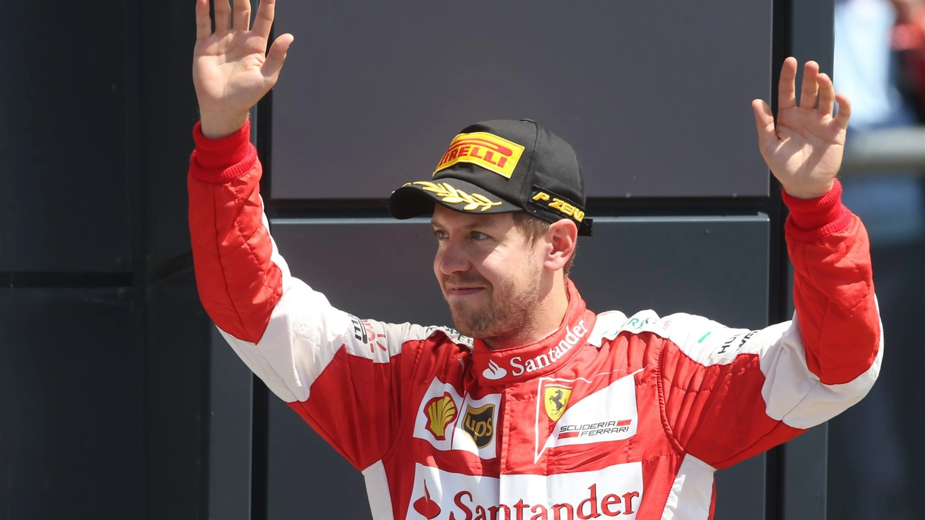 Sebastian Vettel (GER) Ferrari celebrates on the podium at Formula One World Championship, Rd9,