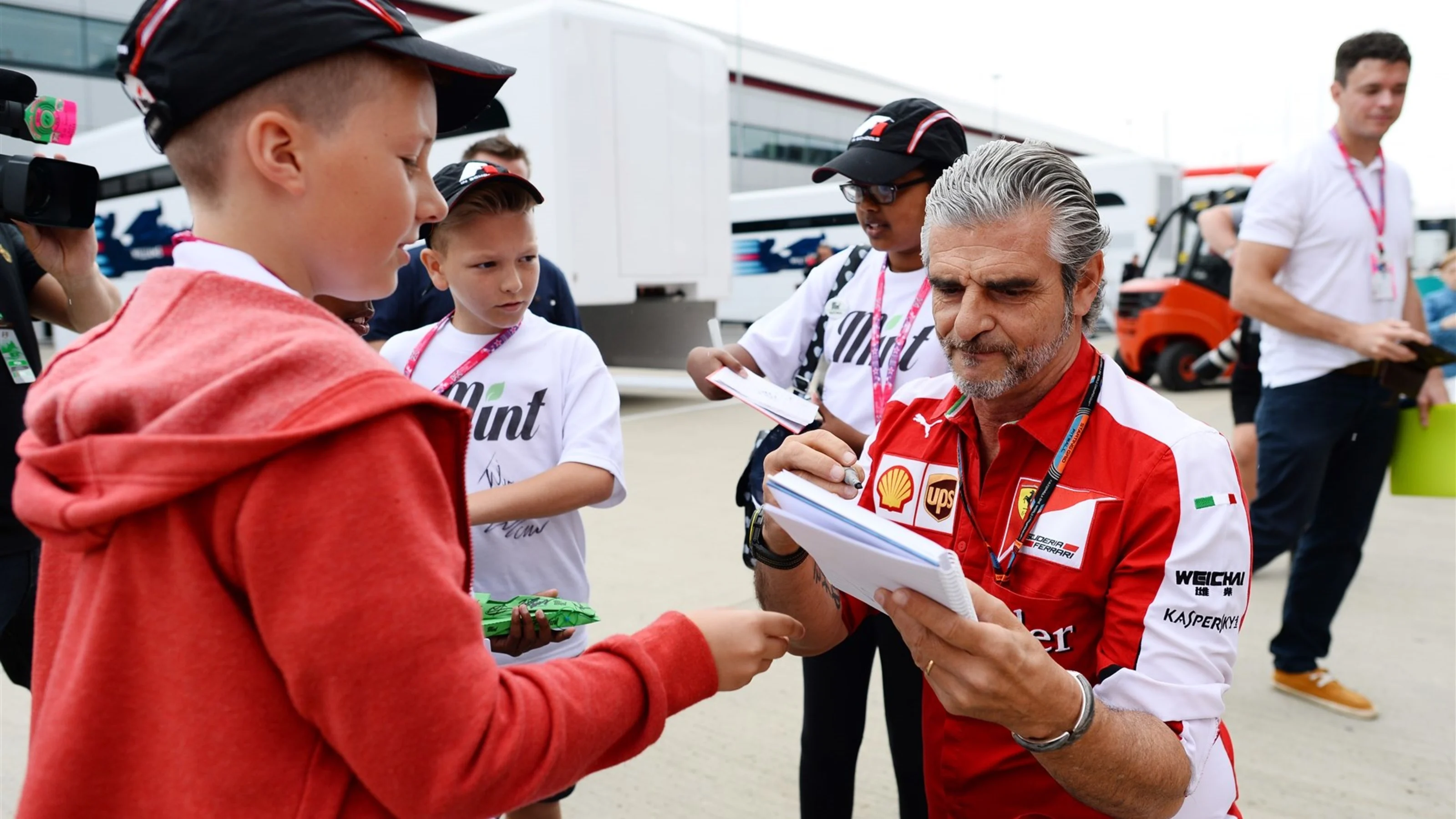 Maurizio Arrivabene (ITA) Ferrari Team Principal signs autographs at Formula One World