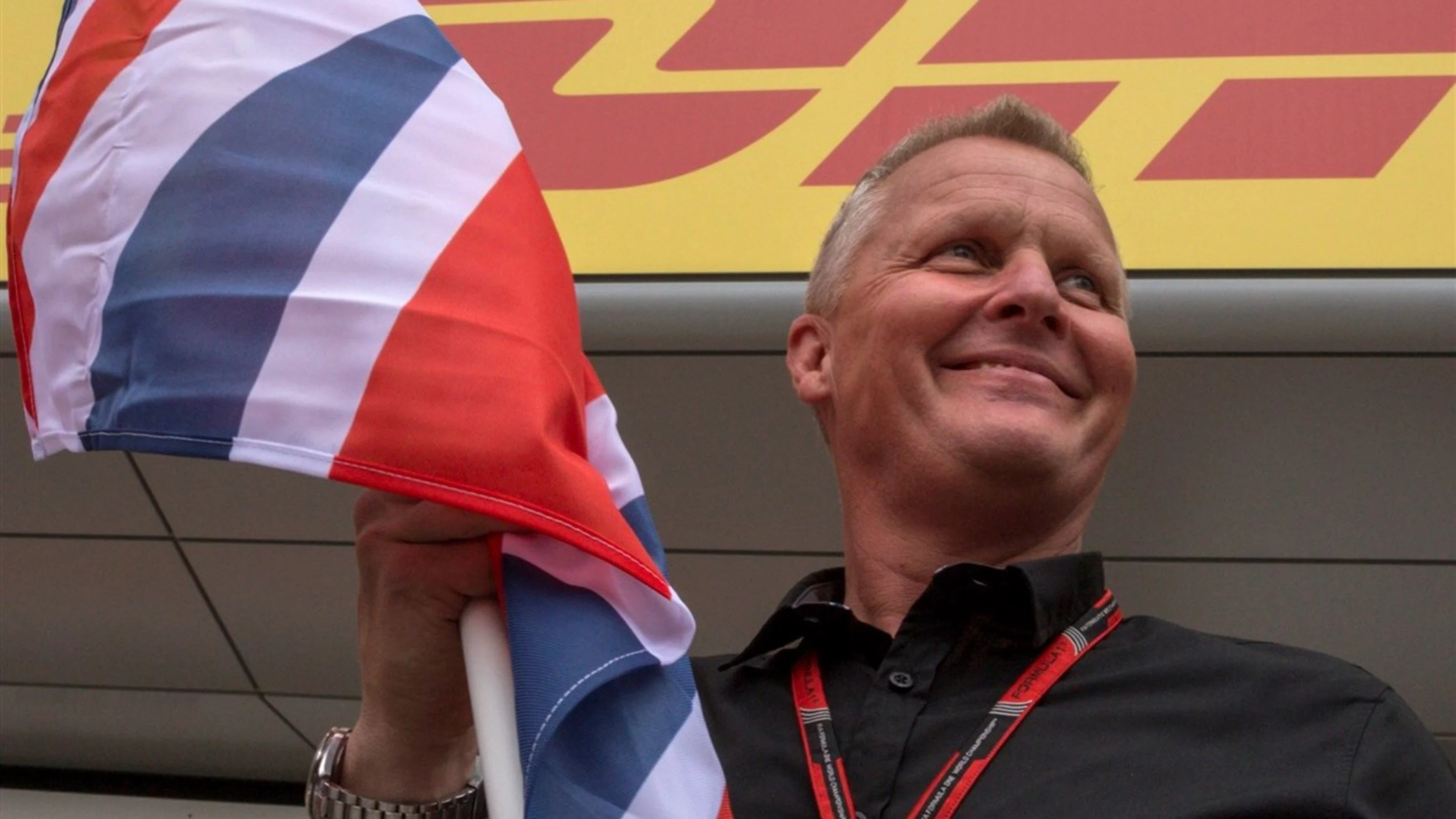 Johnny Herbert (GBR) Sky TV gives away flags to fans at Formula One World Championship, Rd9,