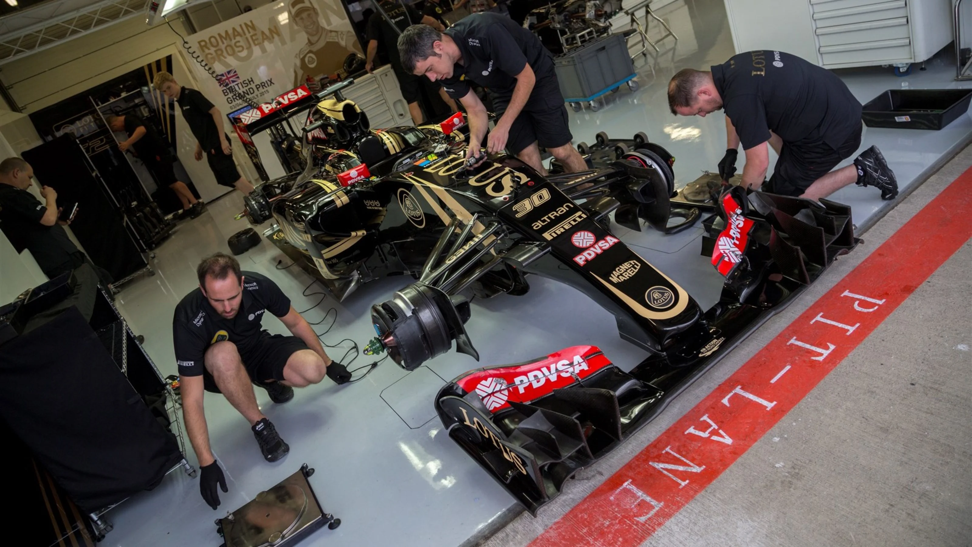 Lotus E23 Hybrid in the garage at Formula One World Championship, Rd9, British Grand Prix,