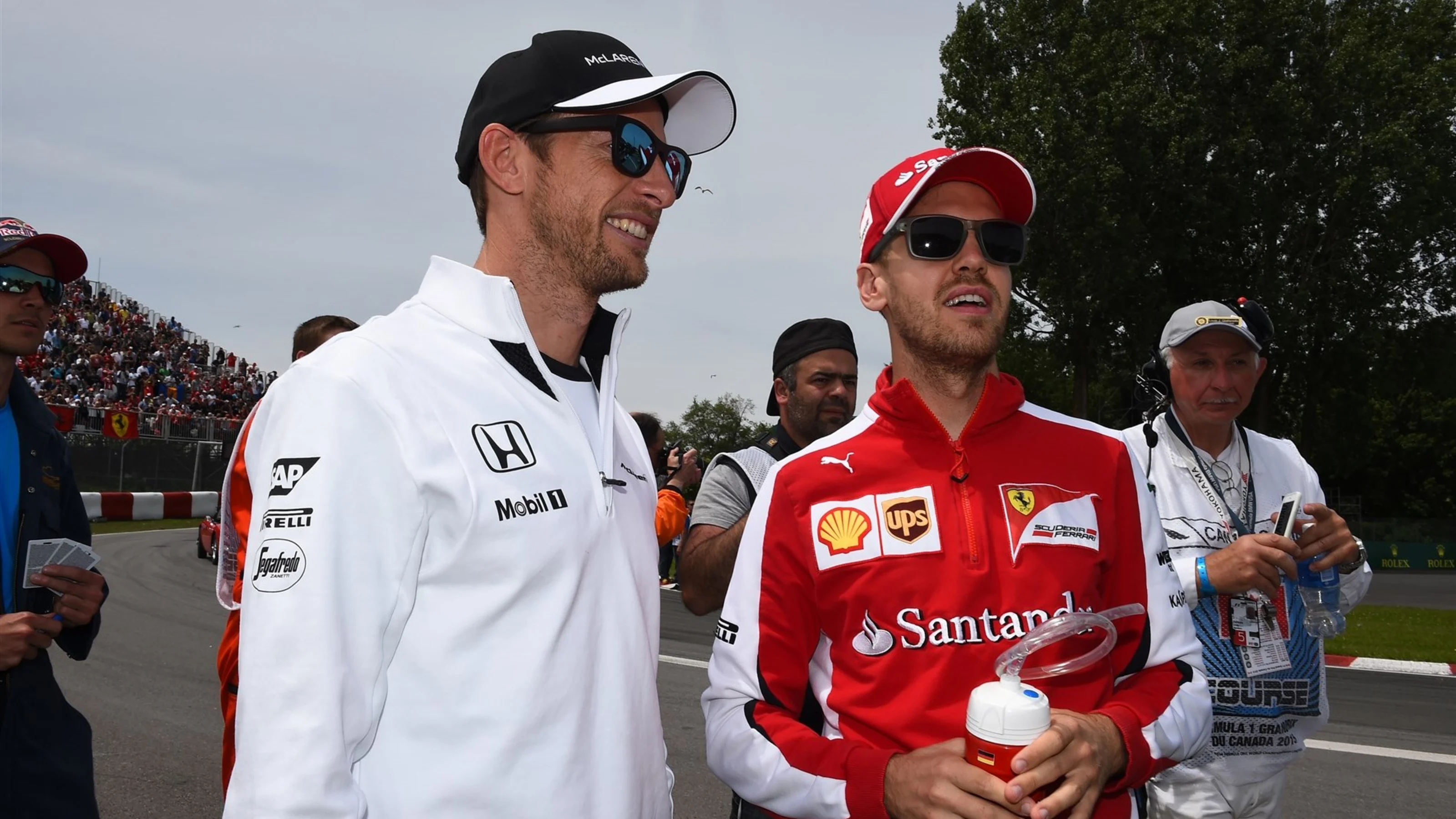Jenson Button (GBR) McLaren and Sebastian Vettel (GER) Ferrari on the drivers parade at Formula One