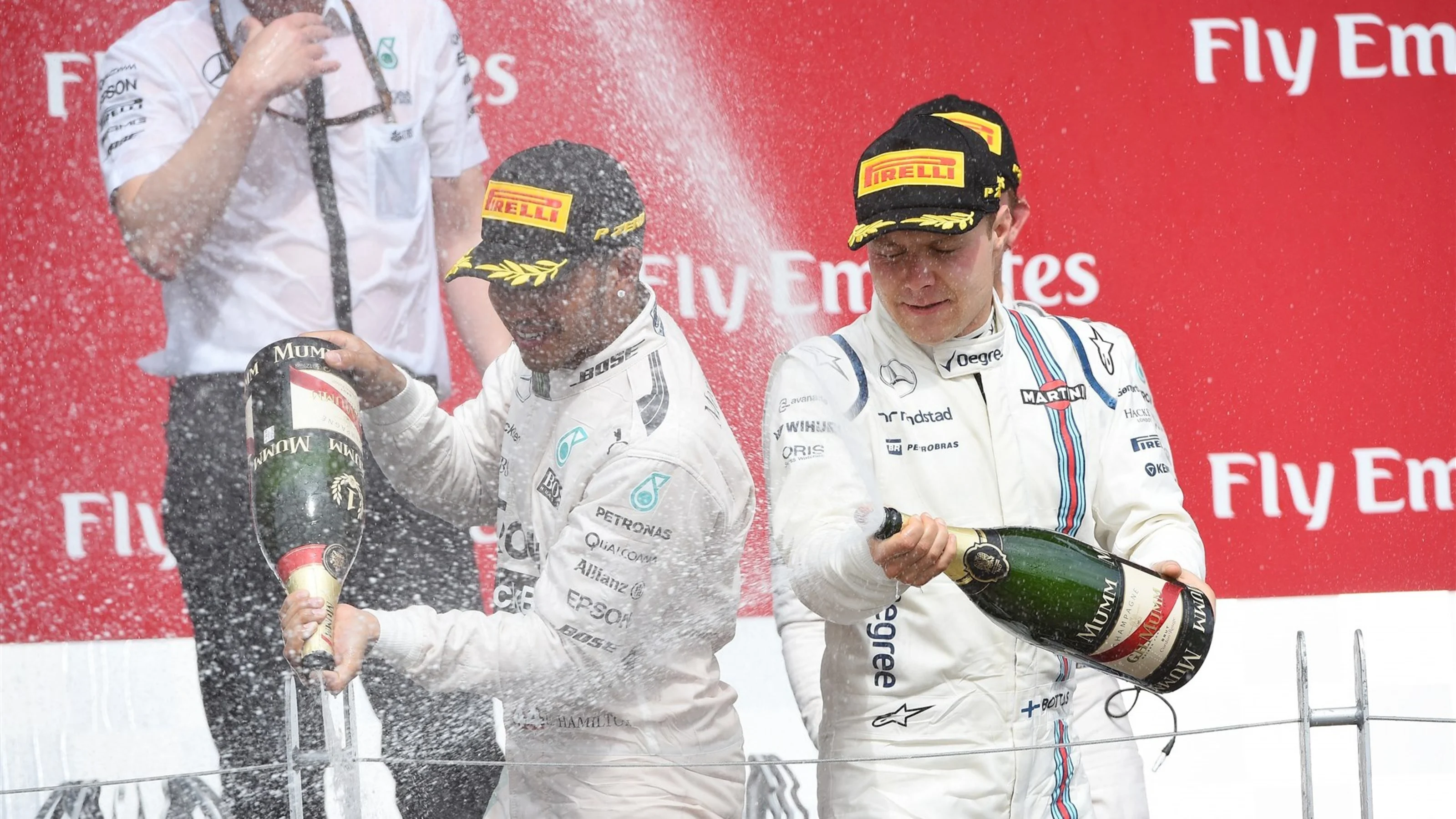 Race winner Lewis Hamilton (GBR) Mercedes AMG F1 and Valtteri Bottas (FIN) Williams  celebrate on