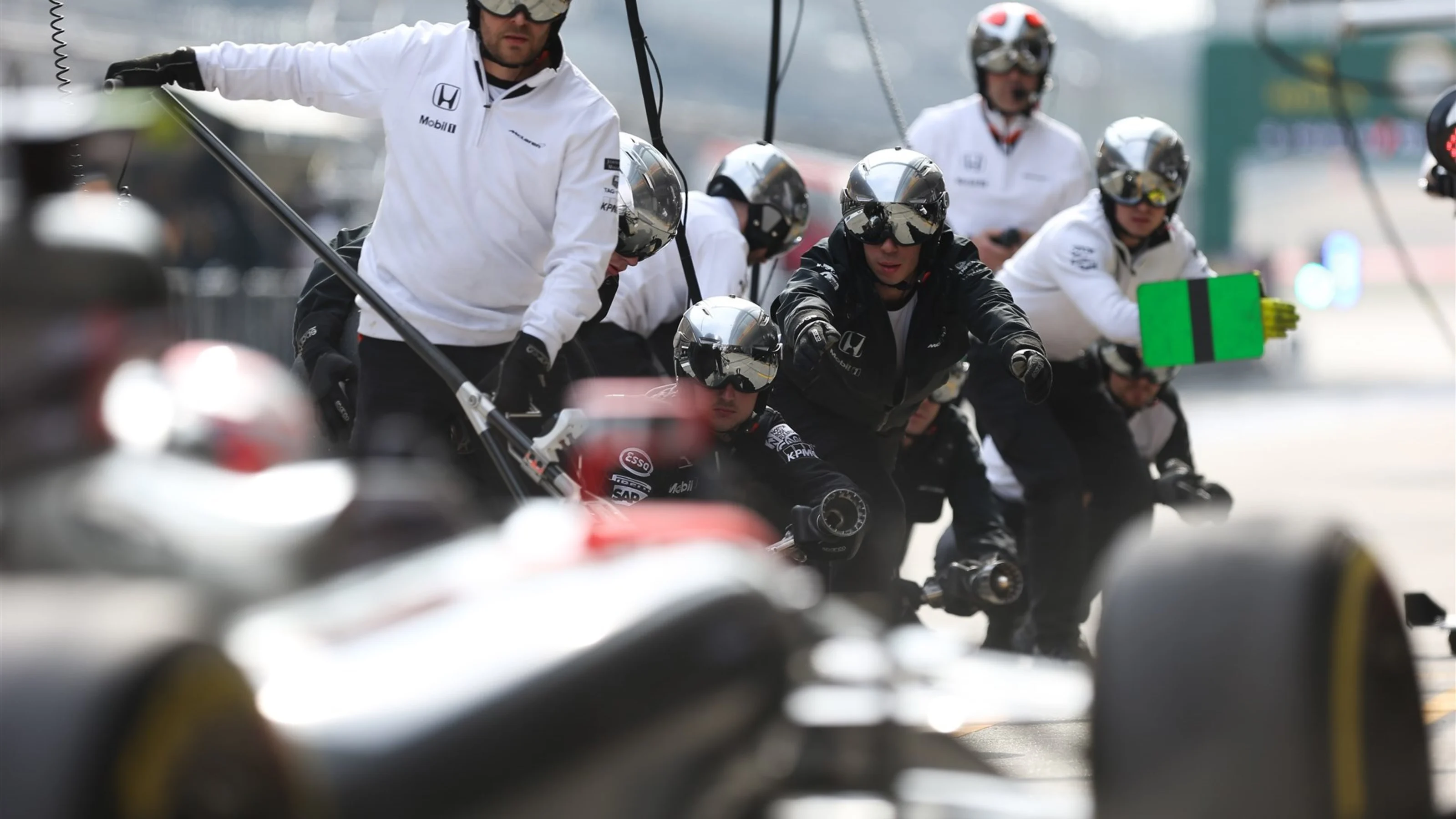 Fernando Alonso (ESP) McLaren MP4-30 makes a pitstop at Formula One World Championship, Rd3,