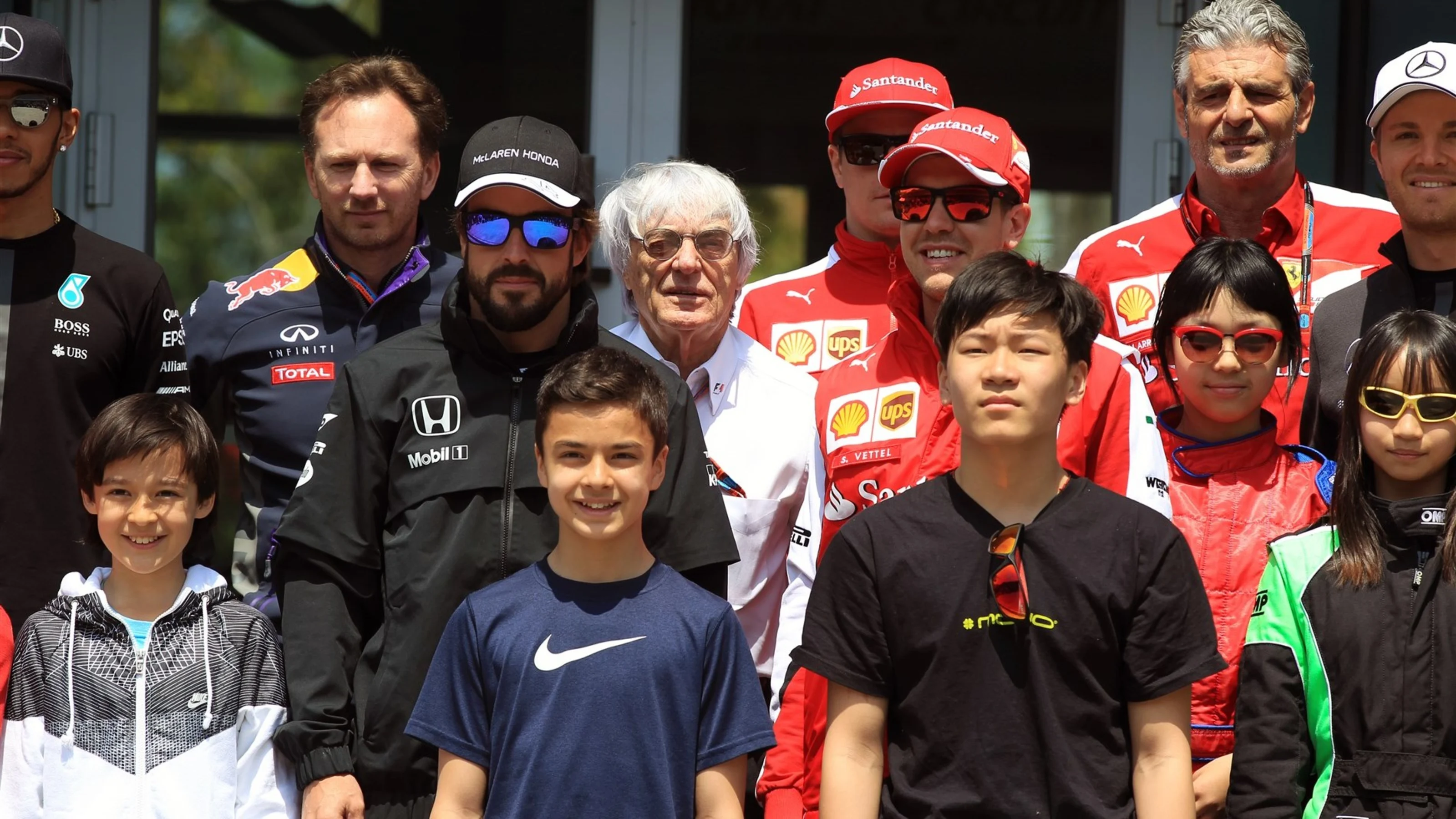Bernie Ecclestone (GBR) CEO Formula One Group (FOM), Fernando Alonso (ESP) McLaren, Christian