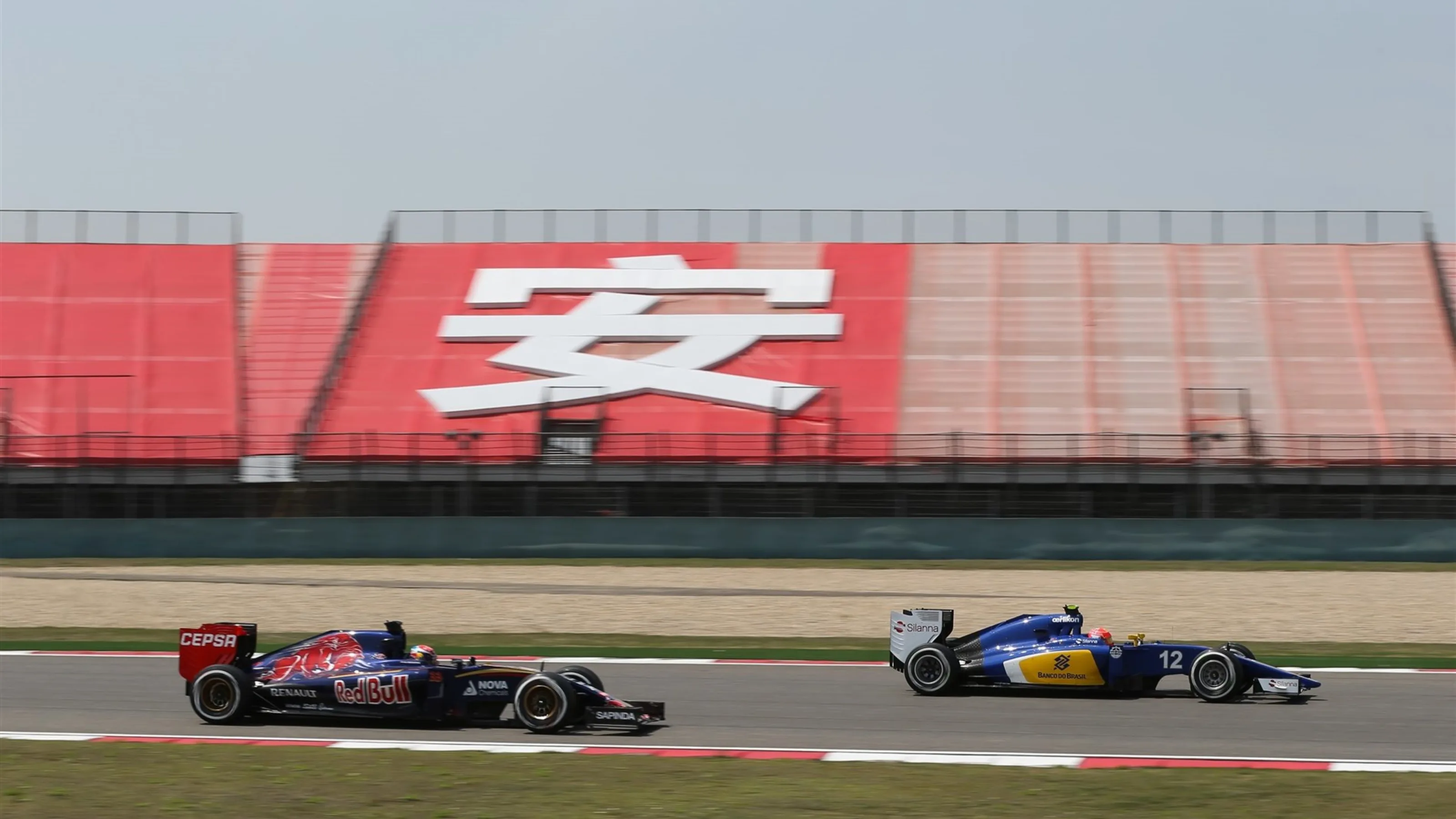 Felipe Nasr (BRA) Sauber C34 ahead Max Verstappen (NDL) Scuderia Toro Rosso STR10 at Formula One