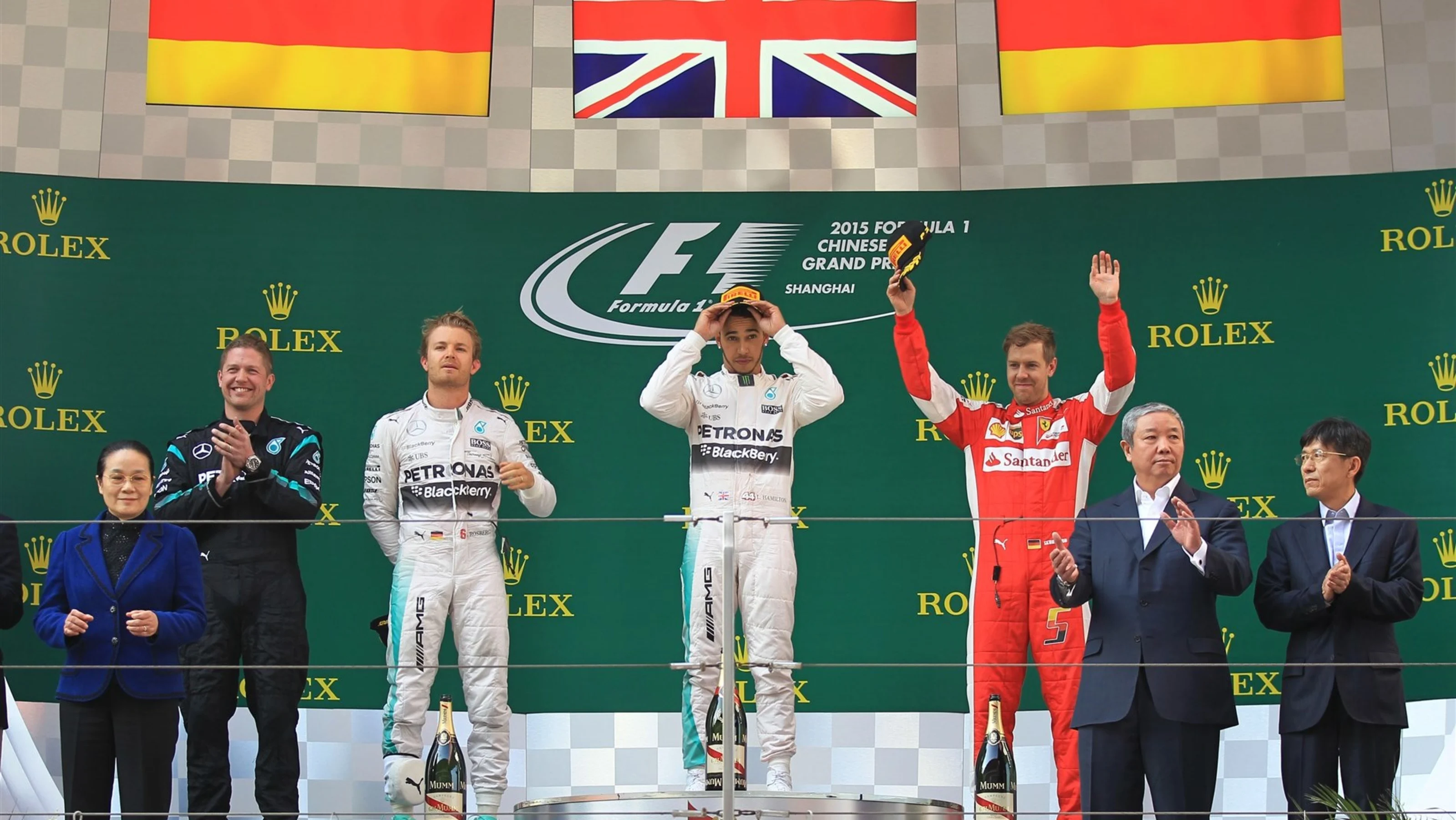 (L to R): Nico Rosberg (GER) Mercedes AMG F1, race winner Lewis Hamilton (GBR) Mercedes AMG F1 and
