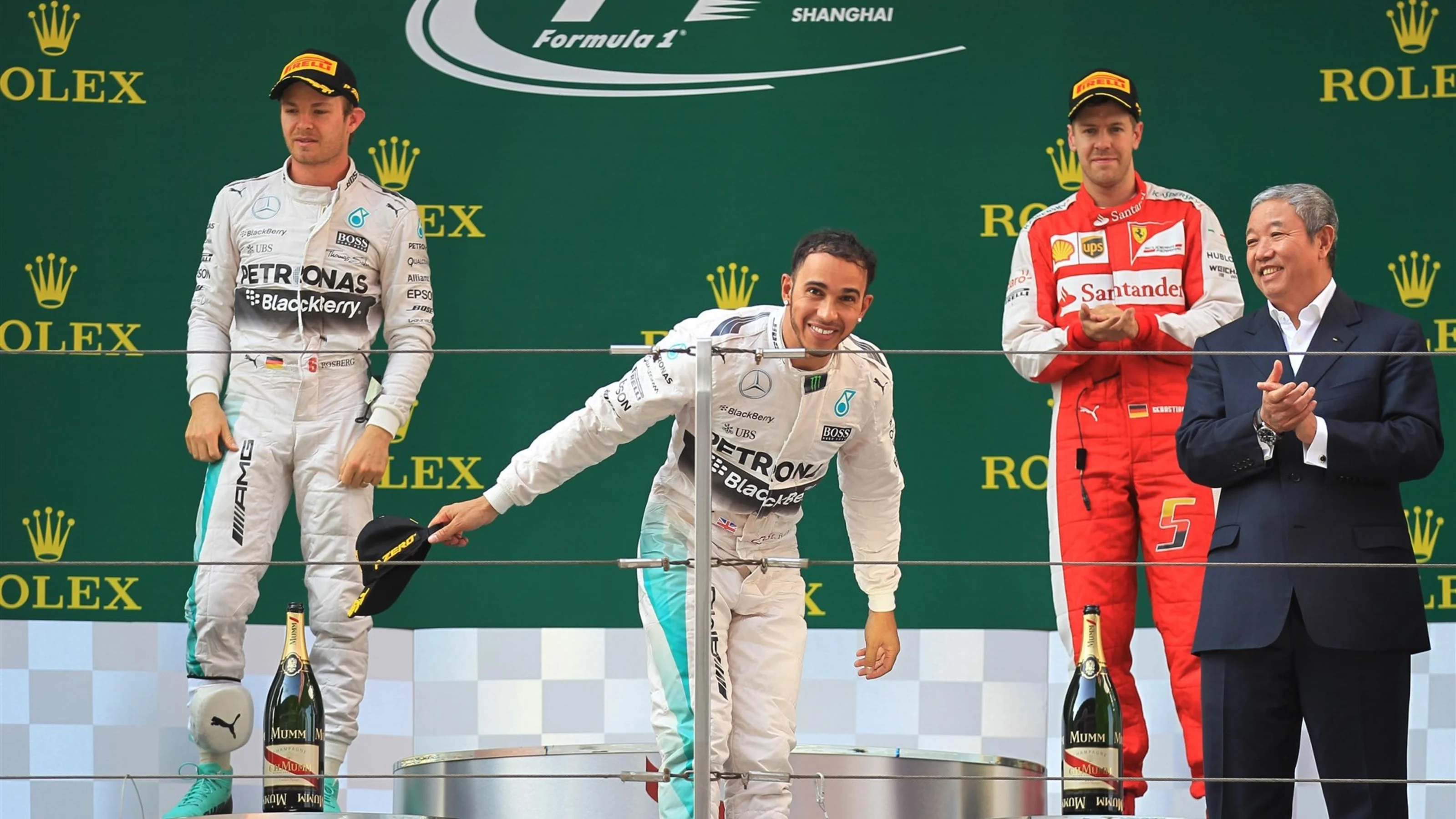 (L to R): Nico Rosberg (GER) Mercedes AMG F1, race winner Lewis Hamilton (GBR) Mercedes AMG F1 and