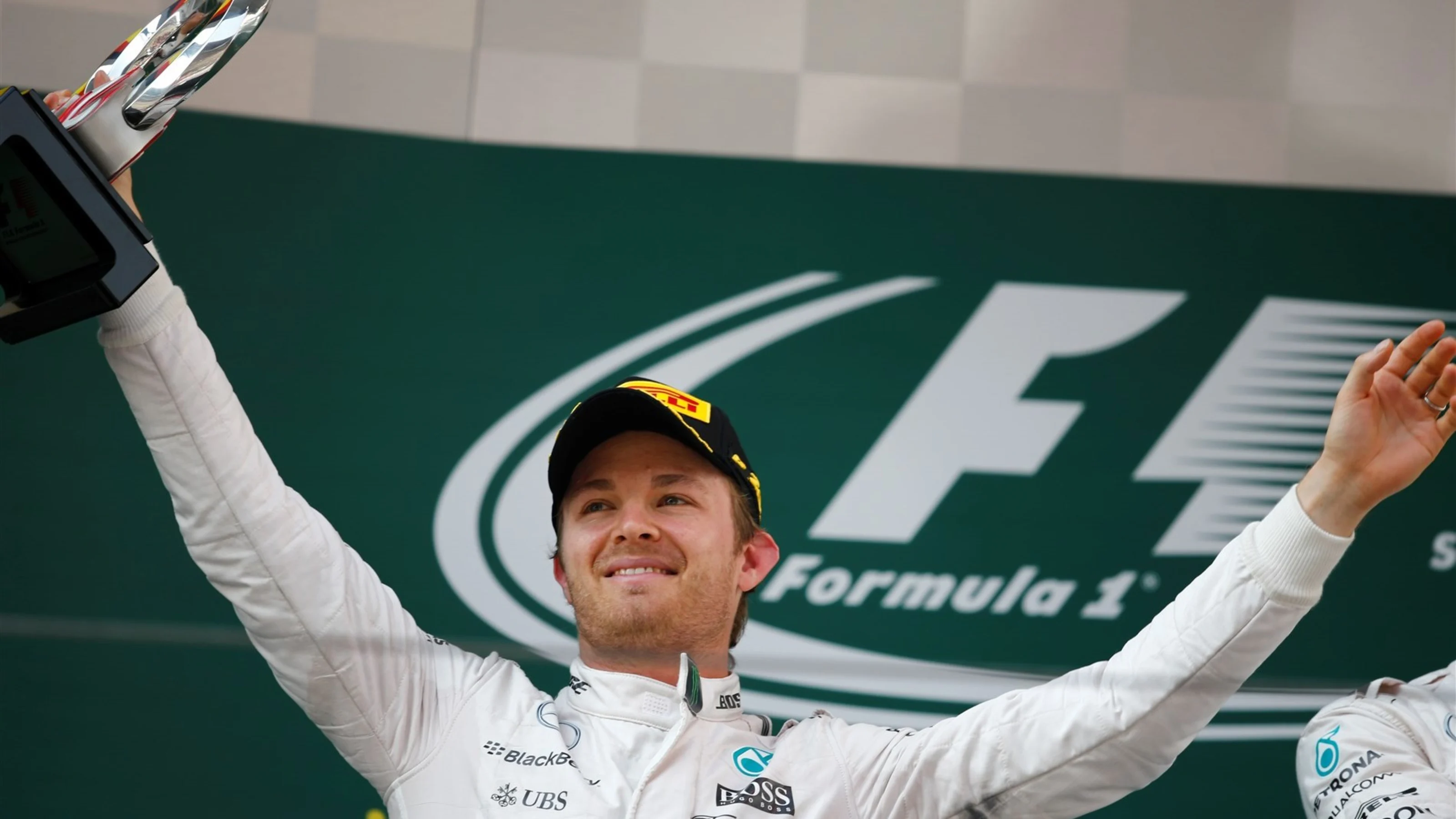 Nico Rosberg (GER) Mercedes AMG F1 on the podium with his tyrophy at Formula One World