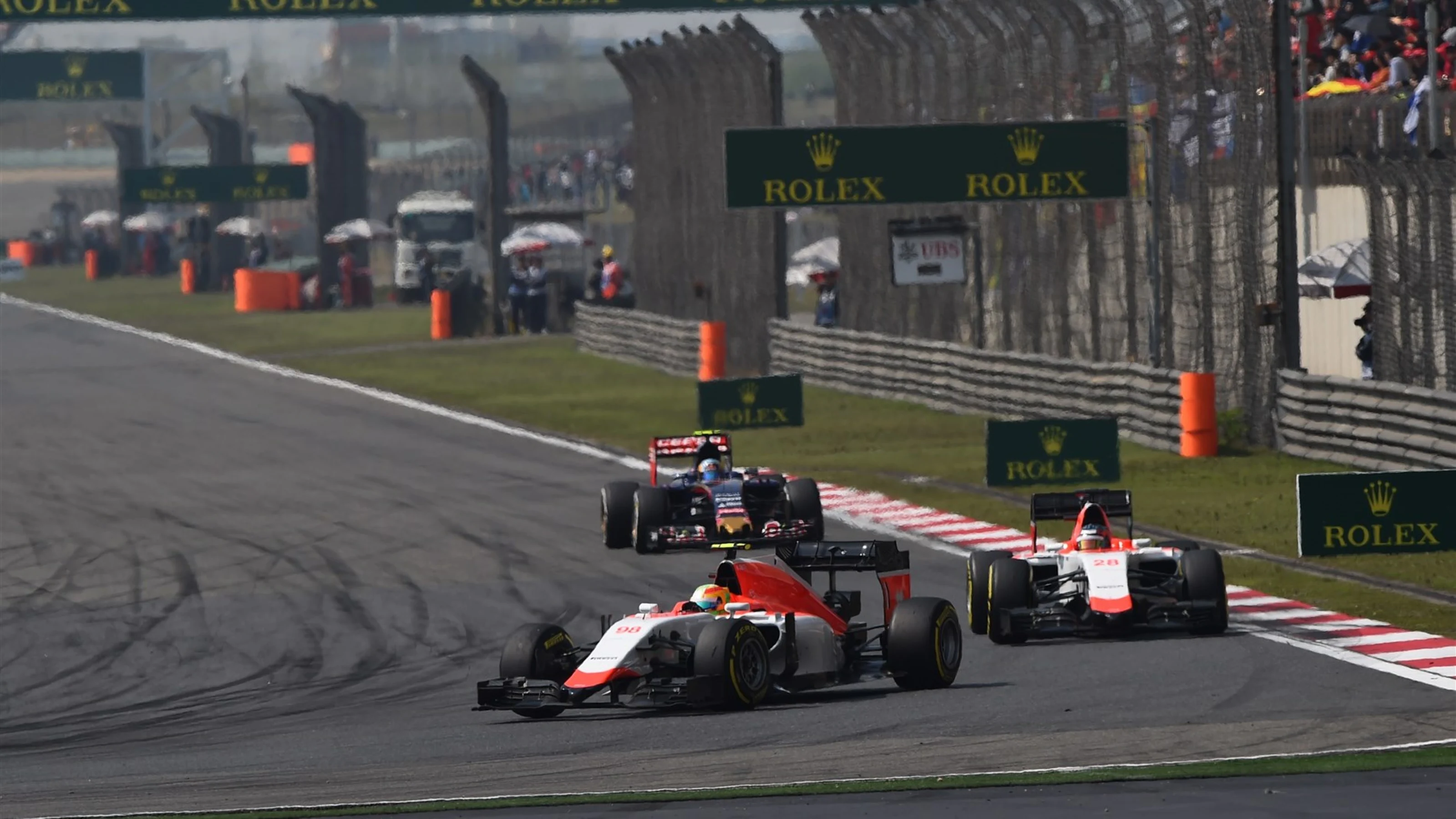 Roberto Merhi (ESP) Manor F1 leads team mate Will Stevens (GBR) Manor F1 at Formula One World