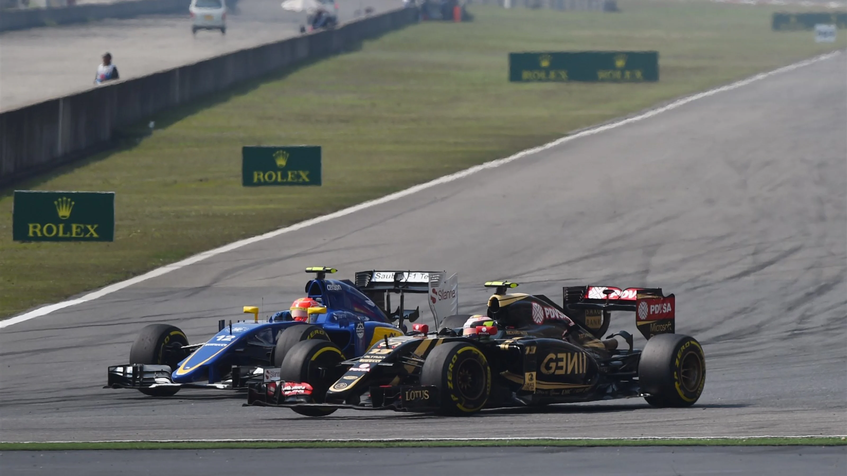 Felipe Nasr (BRA) Sauber C34 and Pastor Maldonado (VEN) Lotus E23 Hybrid battle at Formula One