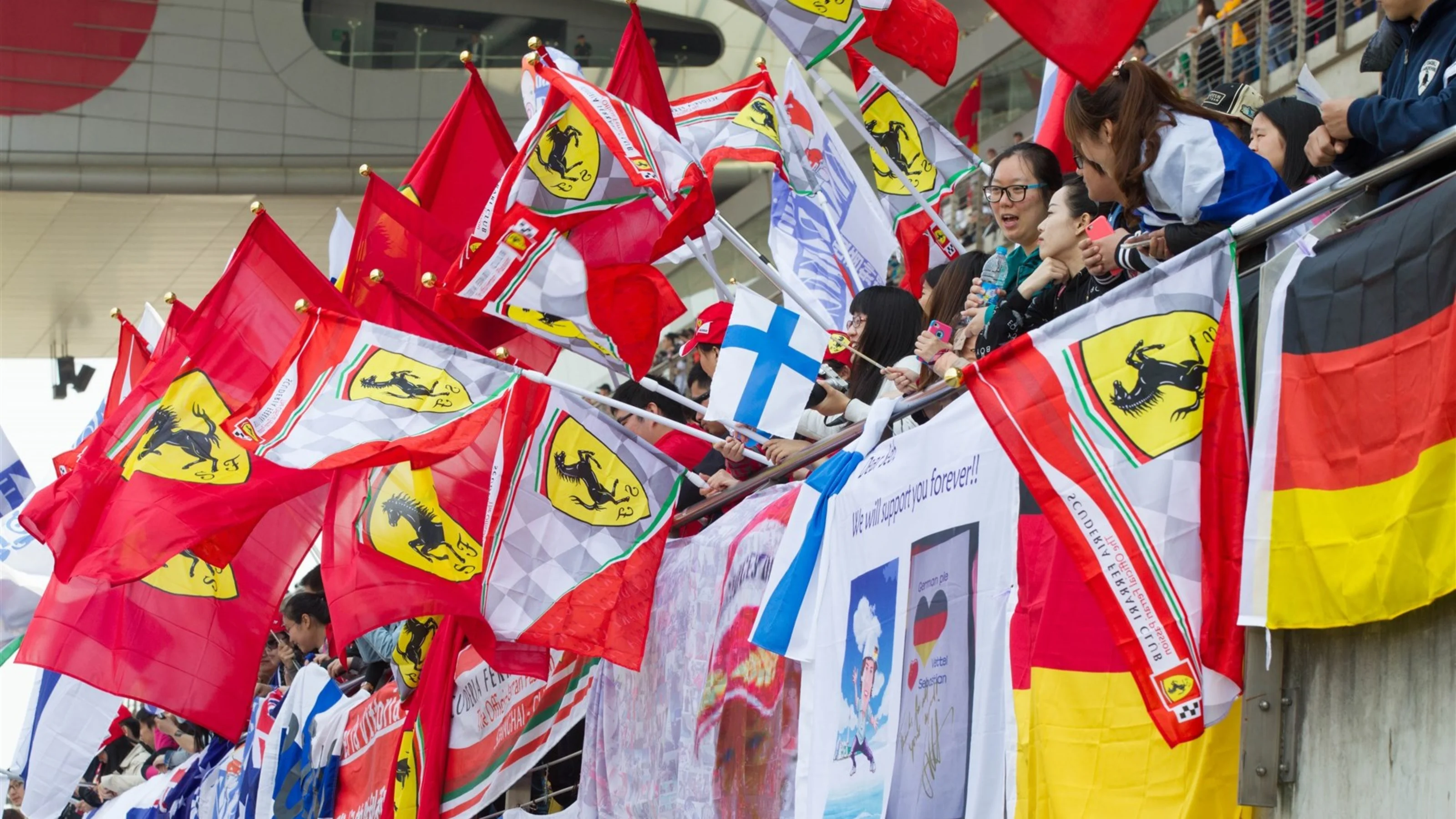 Fans with flags on the main grandstand at Formula One World Championship, Rd3, Chinese Grand Prix,