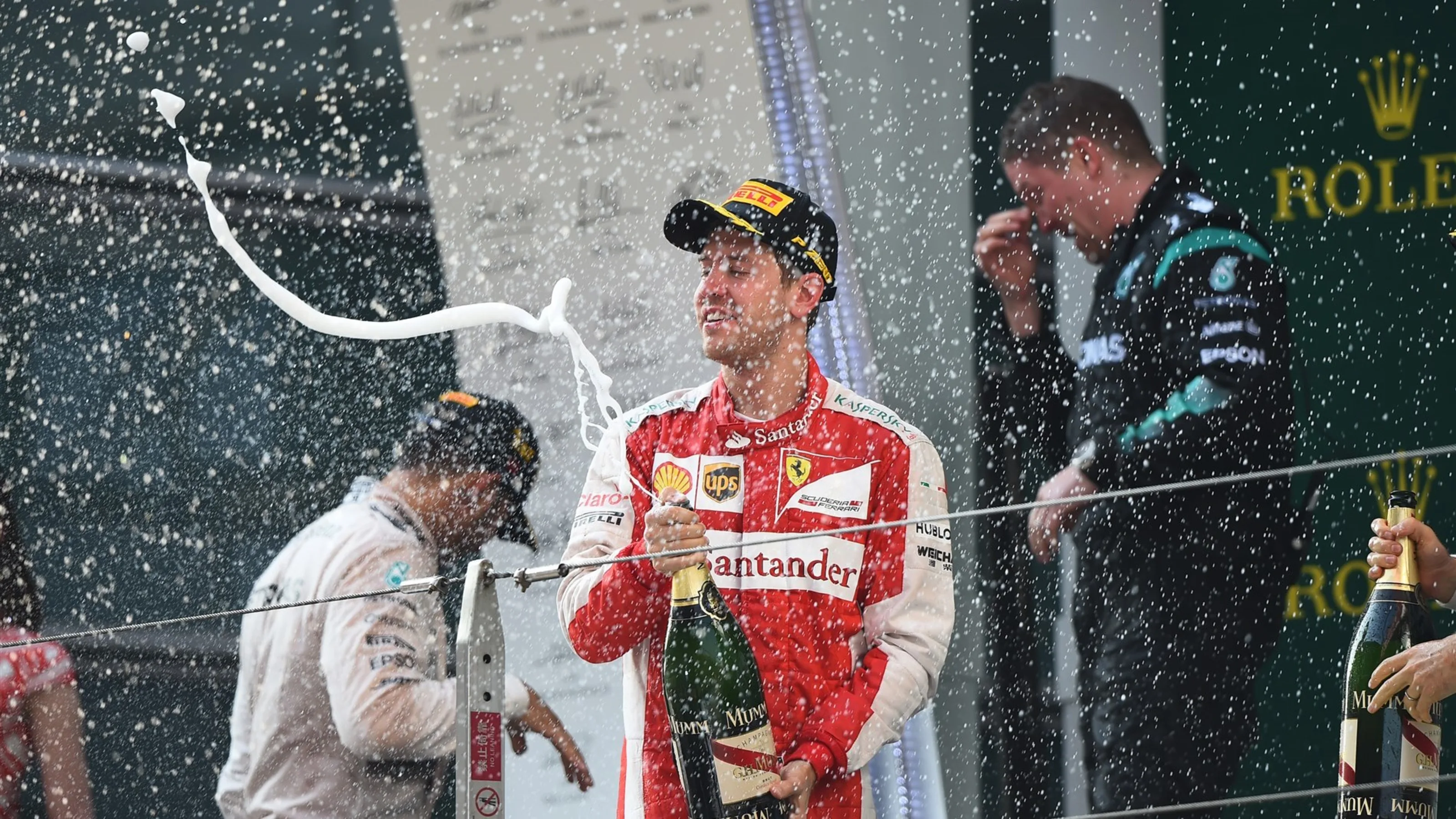 Sebastian Vettel (GER) Ferrari celebrates on the podium with the champagne at Formula One World
