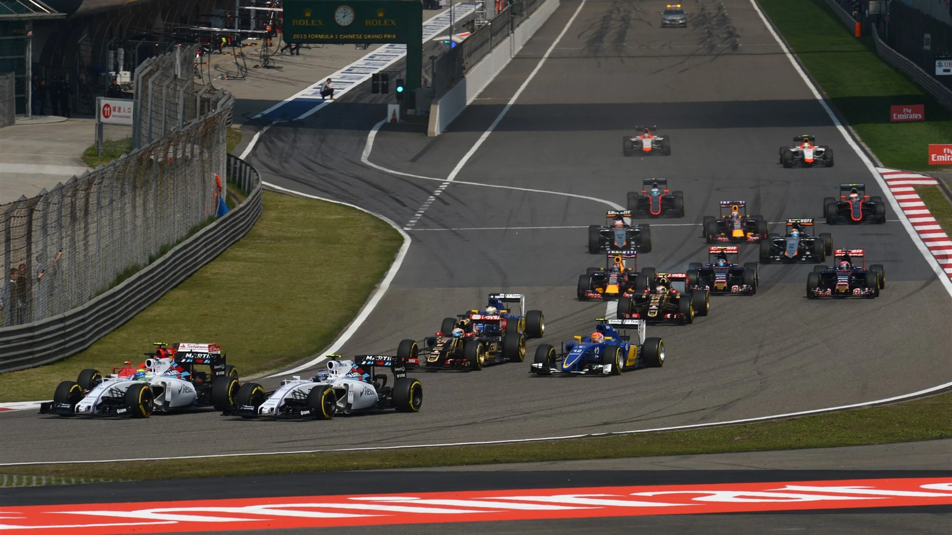Felipe Massa (BRA) Williams FW37 and Valtteri Bottas (FIN) Williams FW37 at the sart of the race at
