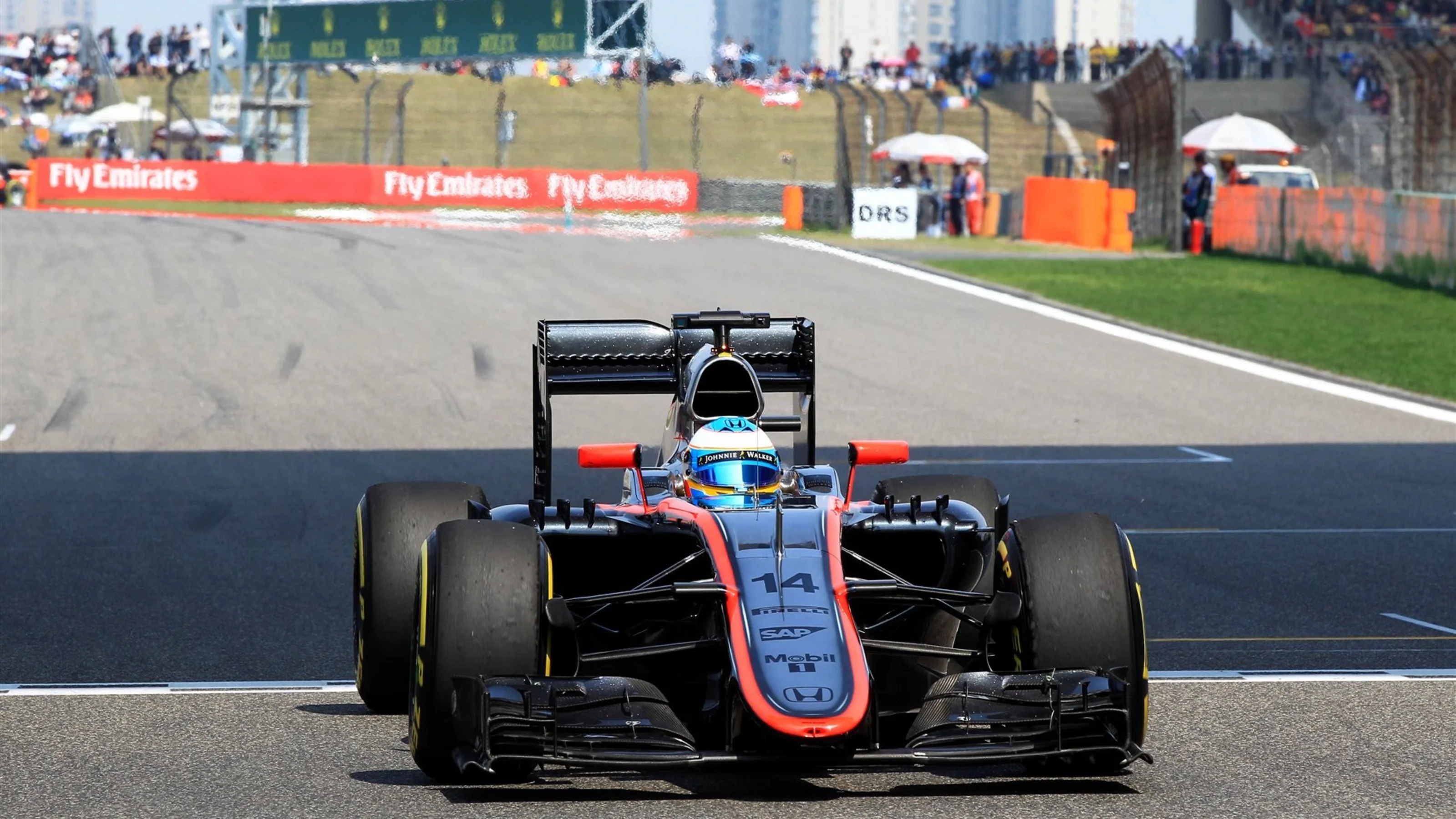 Fernando Alonso (ESP) McLaren MP4-30 on the grid at Formula One World Championship, Rd3, Chinese