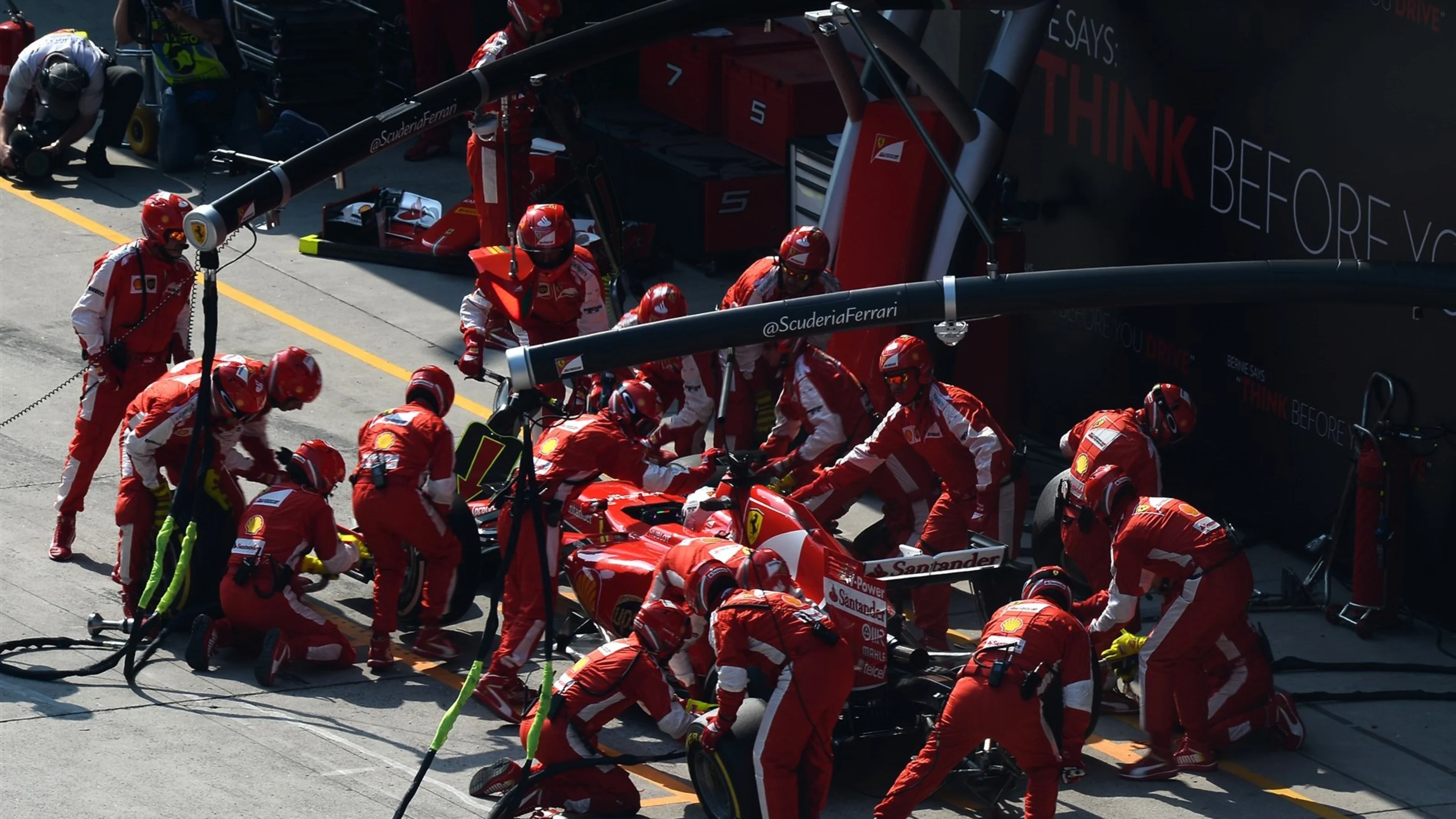 Sebastian Vettel (GER) Ferrari SF15-T pit stop at Formula One World Championship, Rd3, Chinese