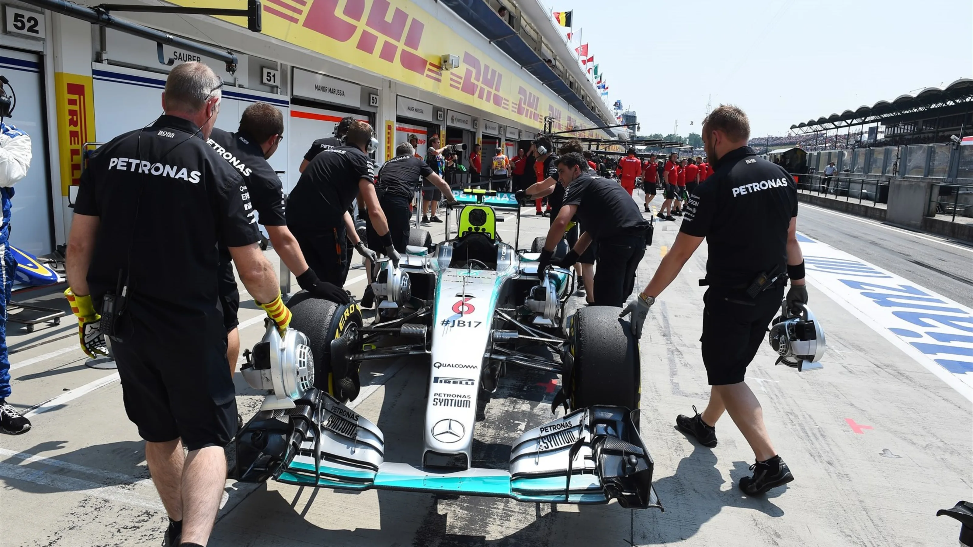 The car of Nico Rosberg (GER) Mercedes AMG F1 W06 is pushed down the pitlane after stopping at the
