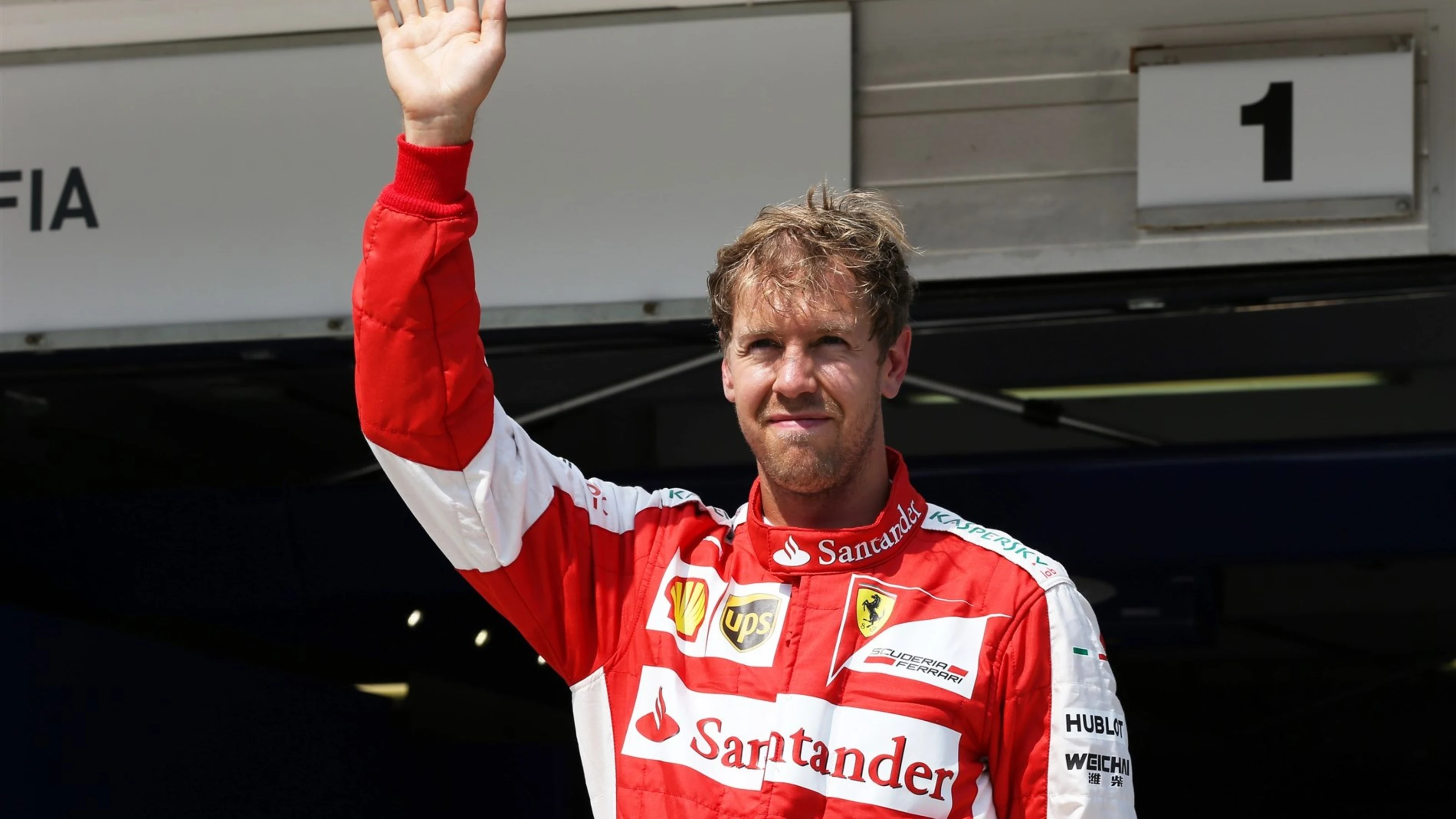 Sebastian Vettel (GER) Ferrari celebrates in parc ferme at Formula One World Championship, Rd10,
