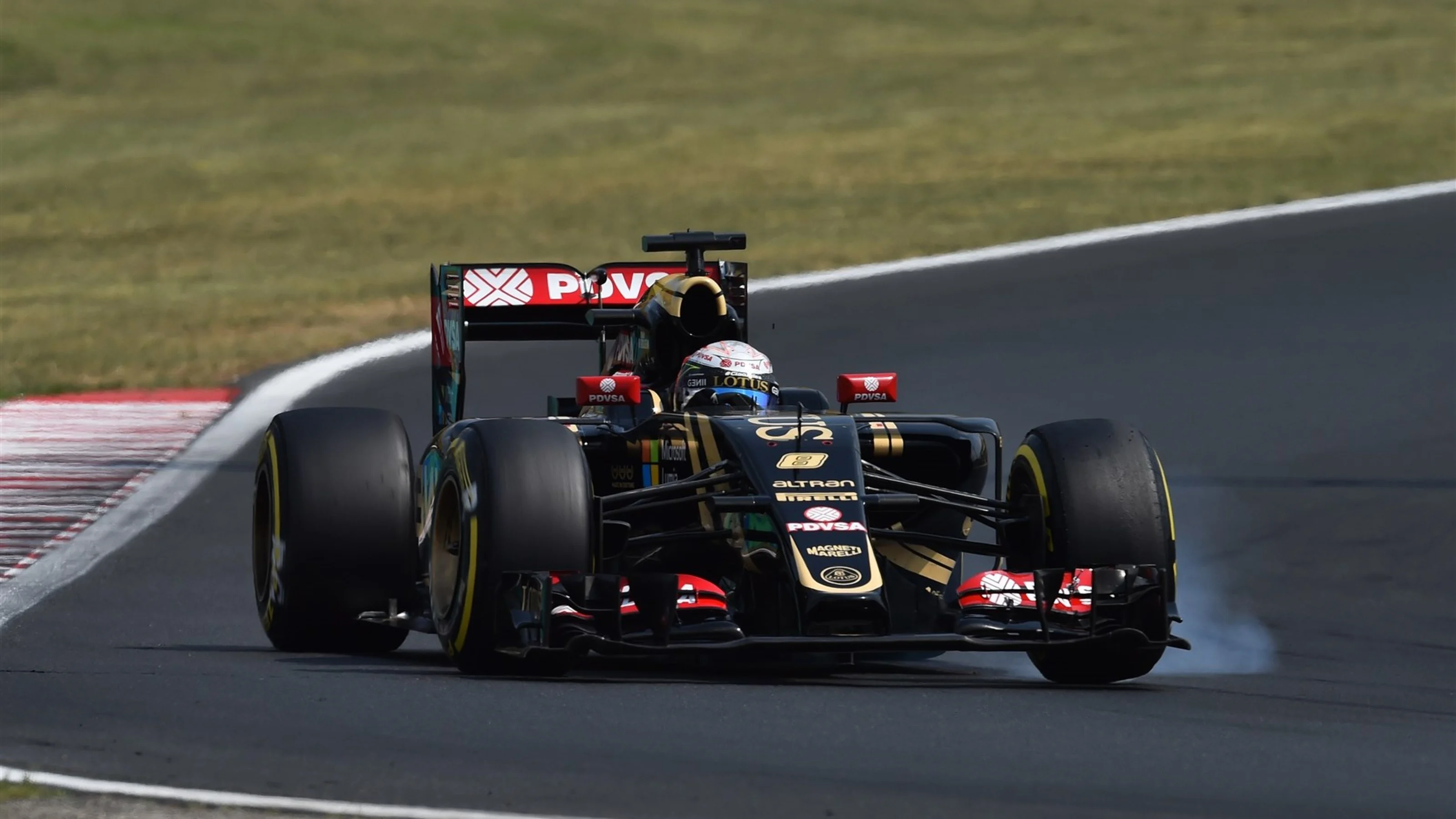 Romain Grosjean (FRA) Lotus E23 Hybrid locks up at Formula One World Championship, Rd10, Hungarian