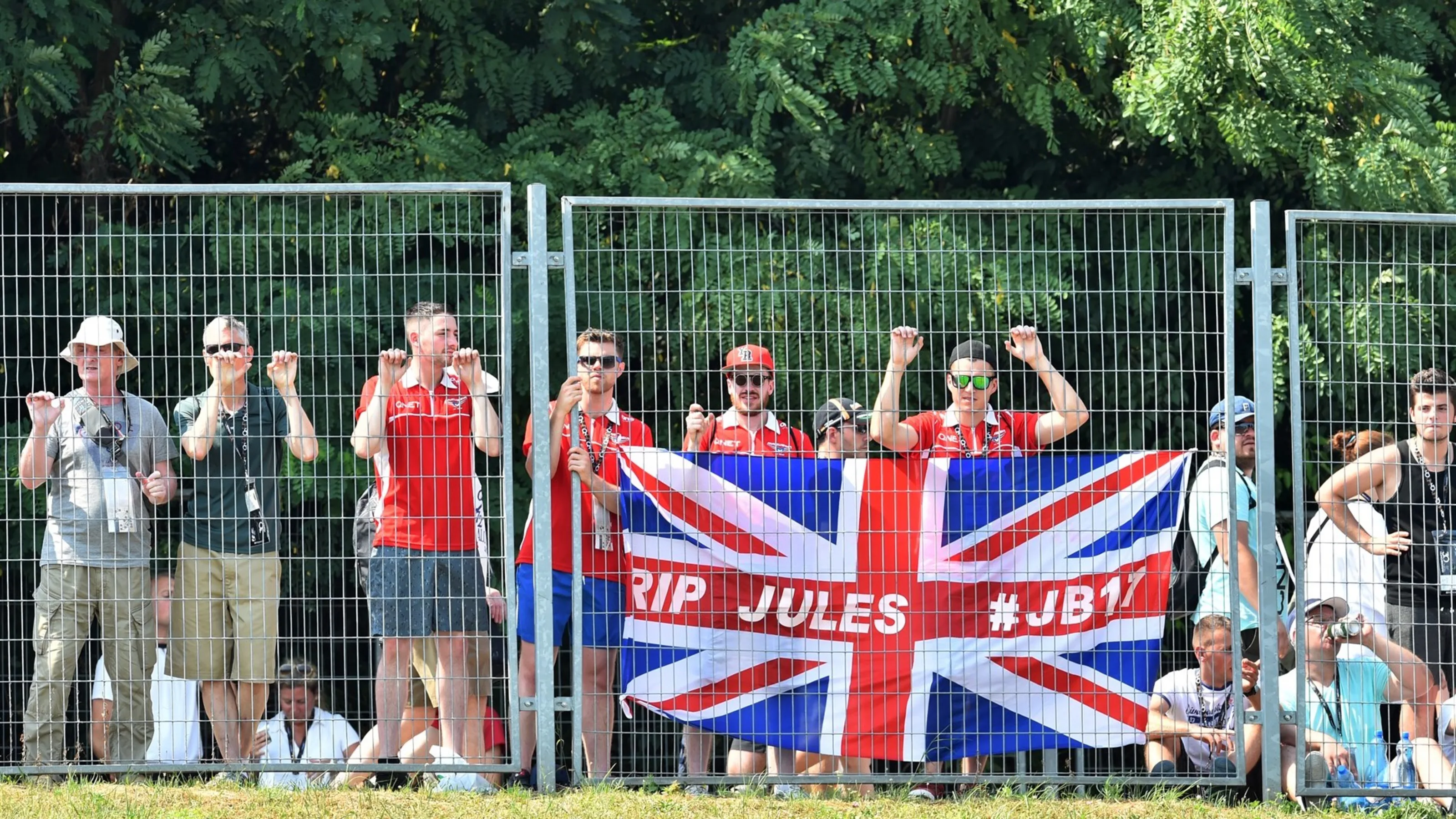 British fans with Union flag tribute to Jules Bianchi at Formula One World Championship, Rd10,