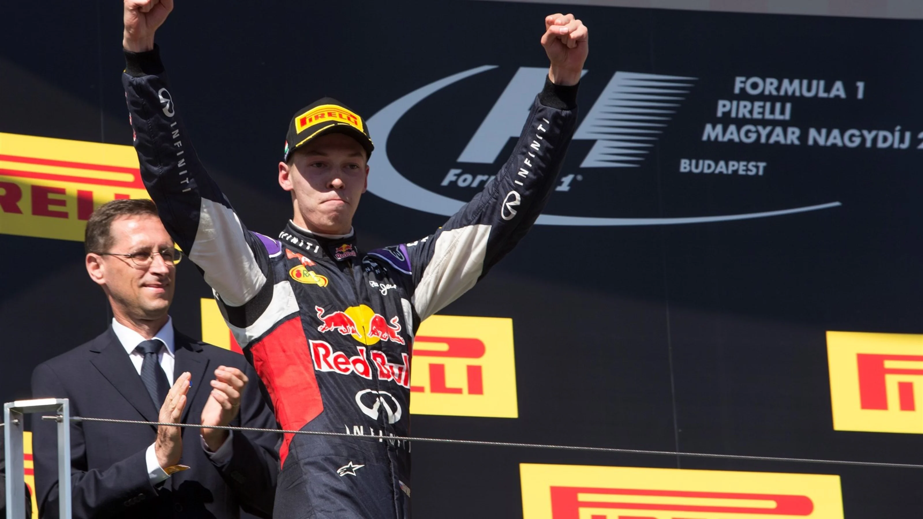 Daniil Kvyat (RUS) Red Bull Racing celebrates on the podium at Formula One World Championship,