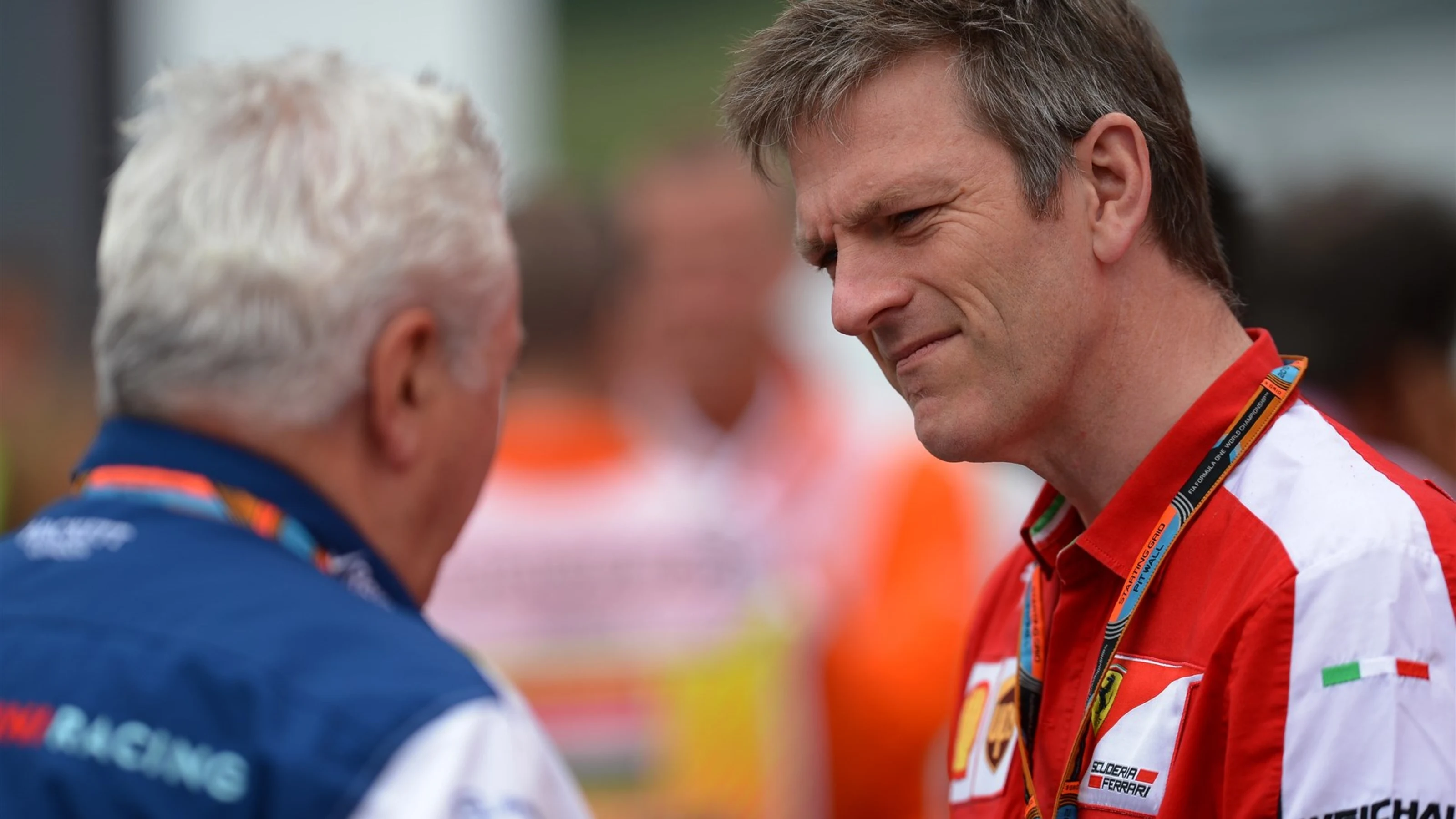 James Allison (GBR) Ferrari Chassis Technical Director talks with Pat Symonds (GBR) Williams