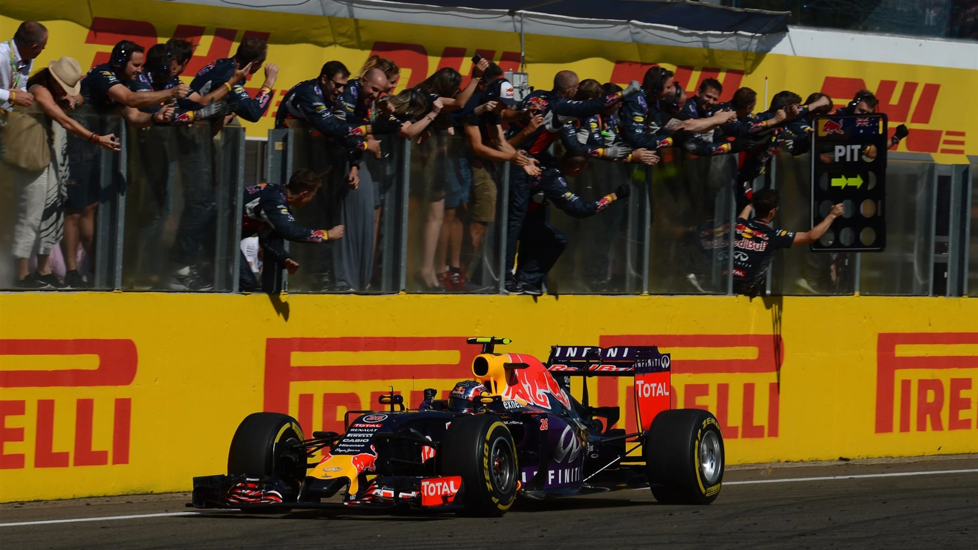 Third placed Daniil Kvyat (RUS) Red Bull Racing RB11 crosses the line at Formula One World