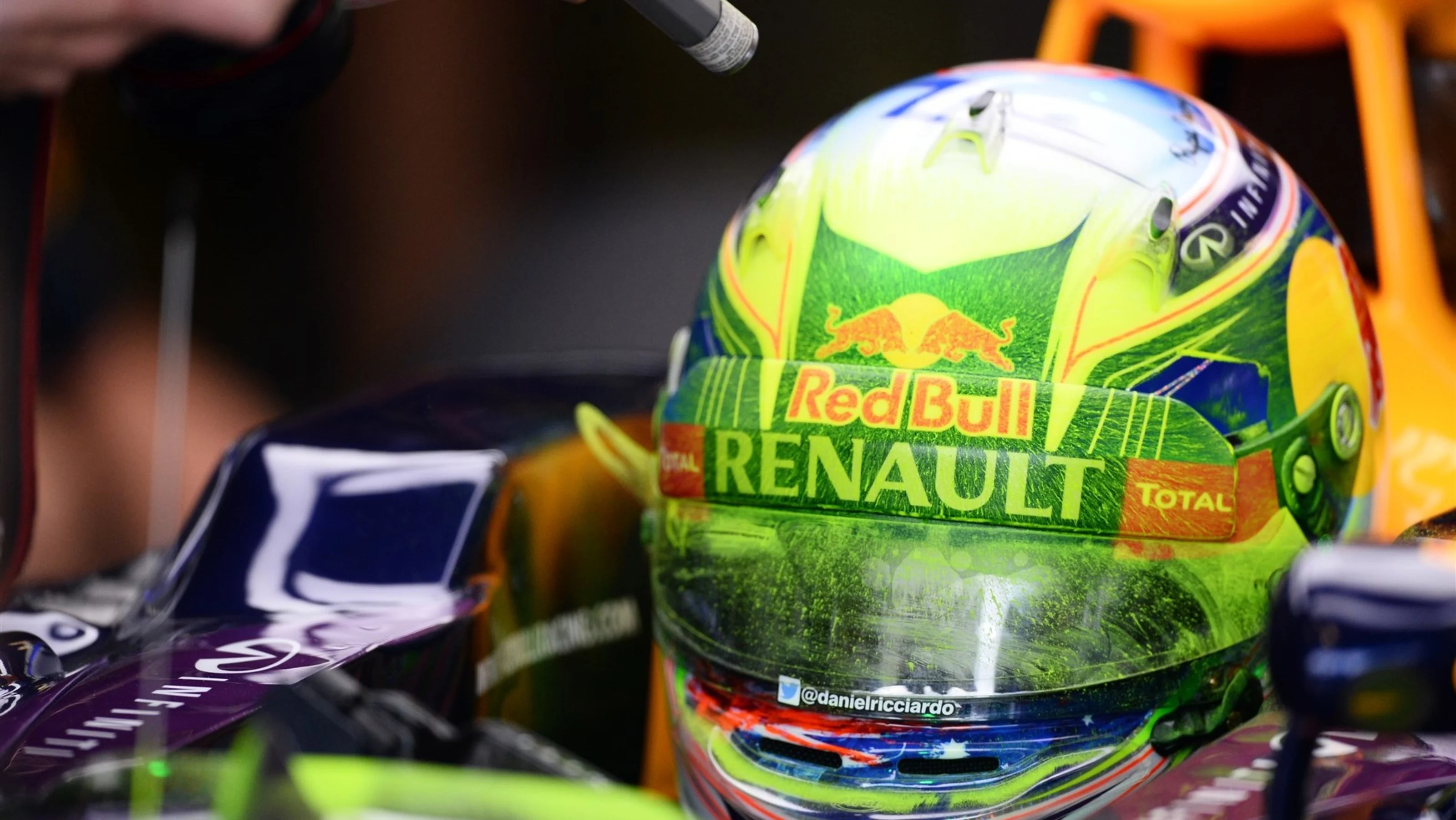 Daniel Ricciardo (AUS) Red Bull Racing RB11 with aero paint on his helmet at Formula One World