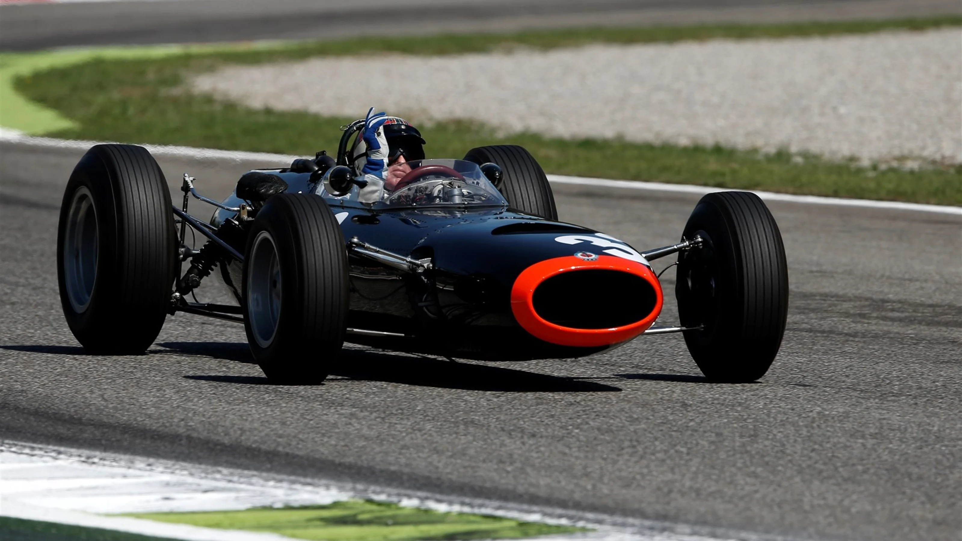 Jackie Stewart (GBR) demonstrates his 1965 Italian Grand Prix winning BRM P261 at Formula One World