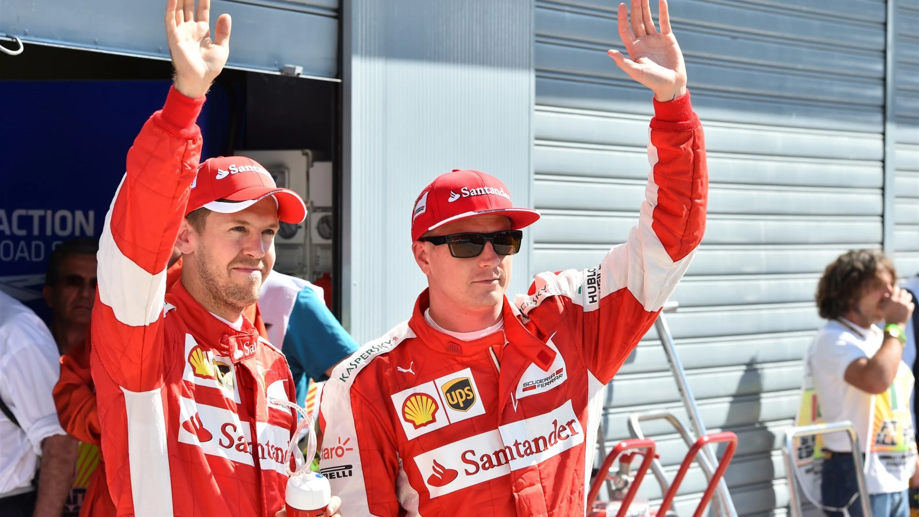 Sebastian Vettel (GER) Ferrari and Kimi Raikkonen (FIN) Ferrari celebrate in parc ferme at Formula