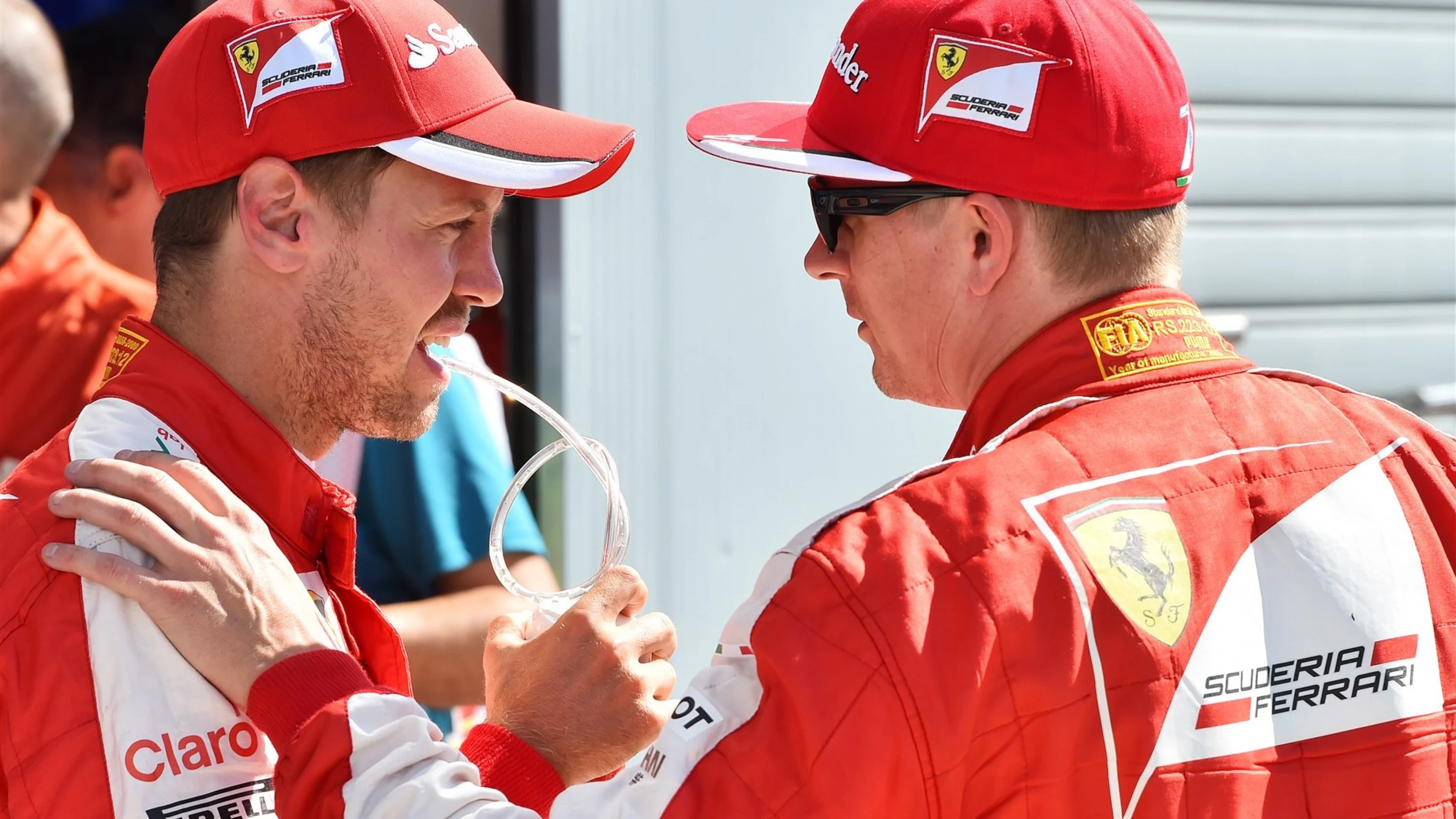 Sebastian Vettel (GER) Ferrari and Kimi Raikkonen (FIN) Ferrari in parc ferme at Formula One World