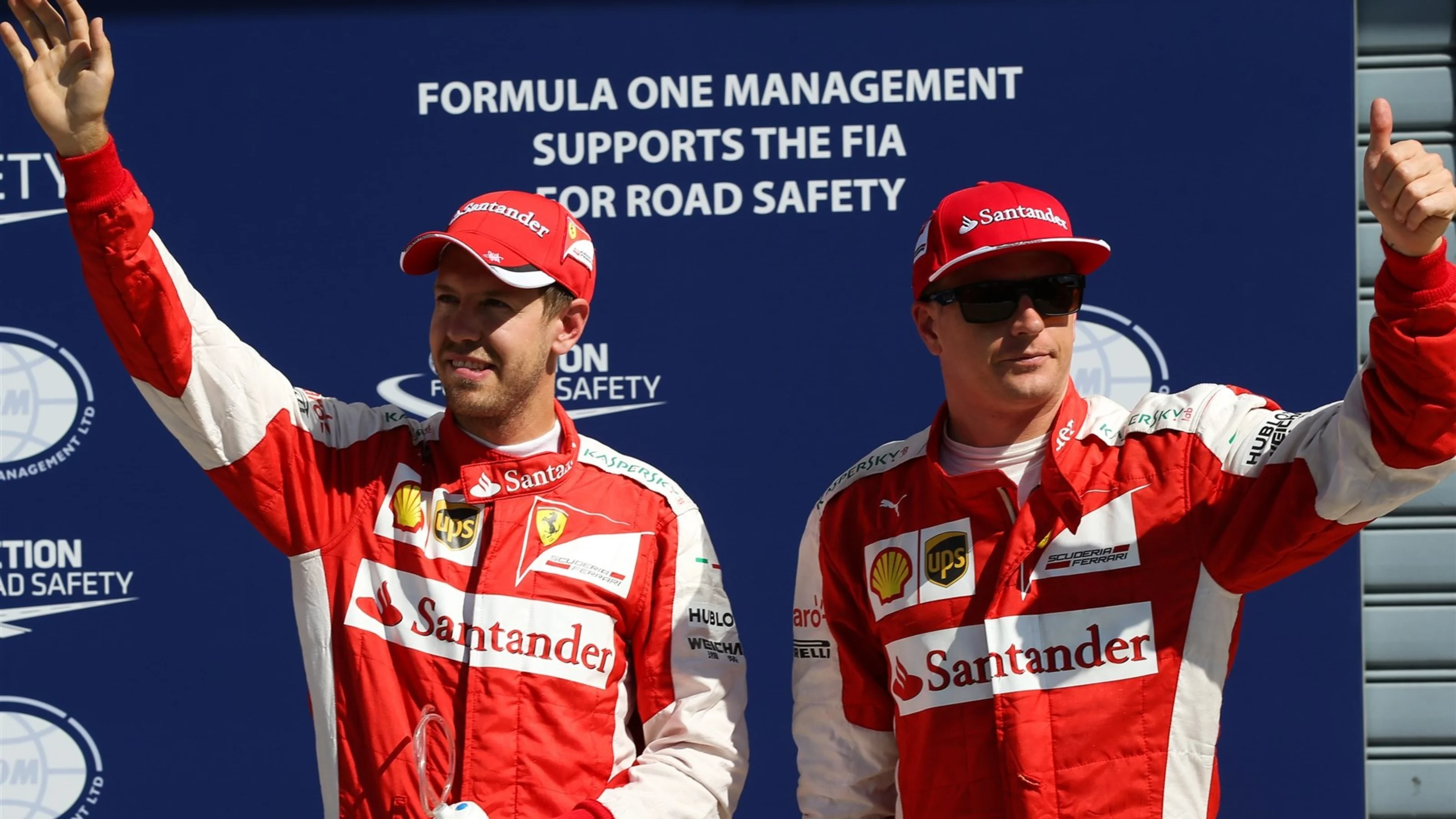 Sebastian Vettel (GER) Ferrari and Kimi Raikkonen (FIN) Ferrari celebrates in parc ferme at Formula