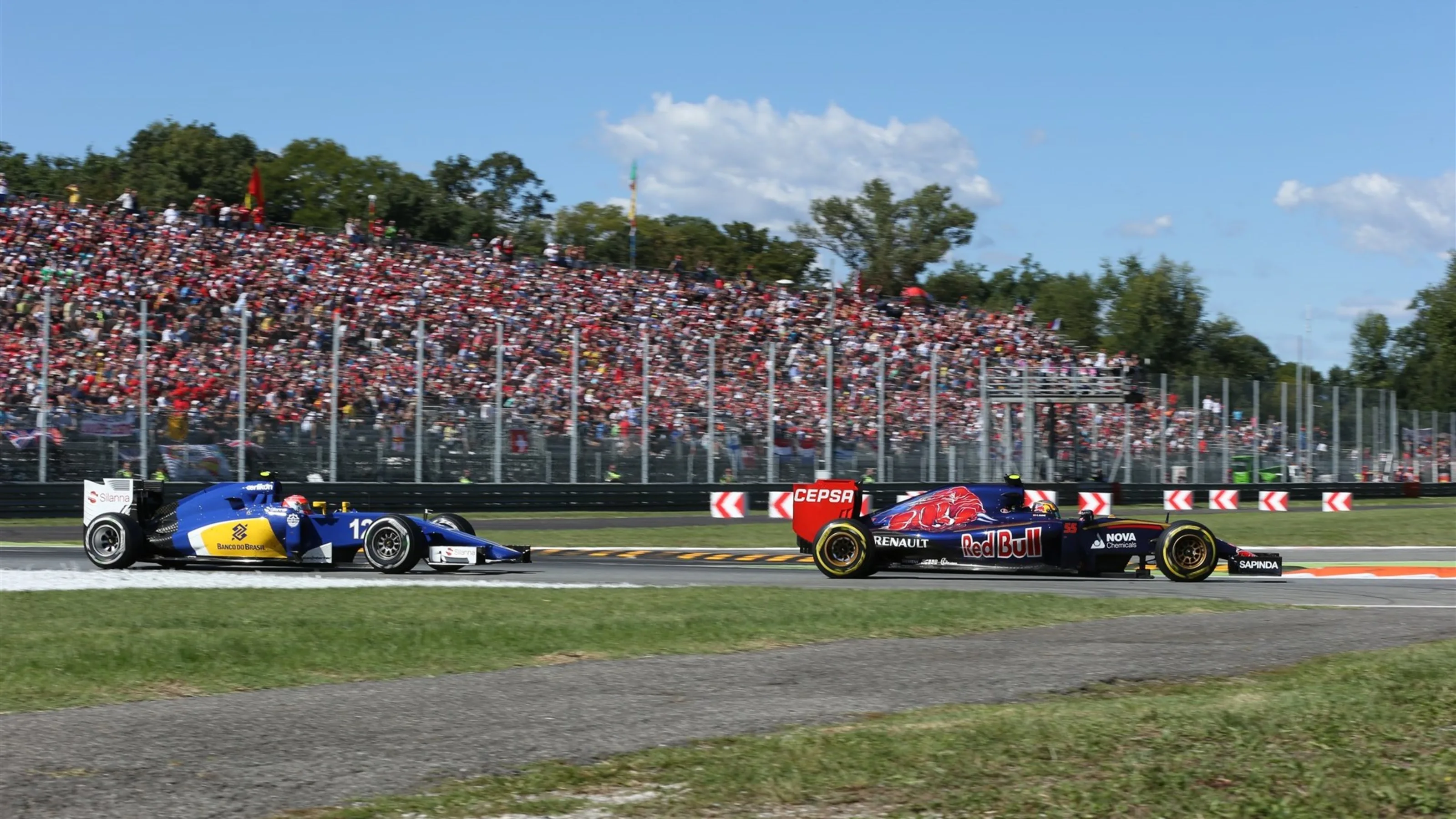 Felipe Nasr (BRA) Sauber C34 and Carlos Sainz jr (ESP) Scuderia Toro Rosso STR10 at Formula One