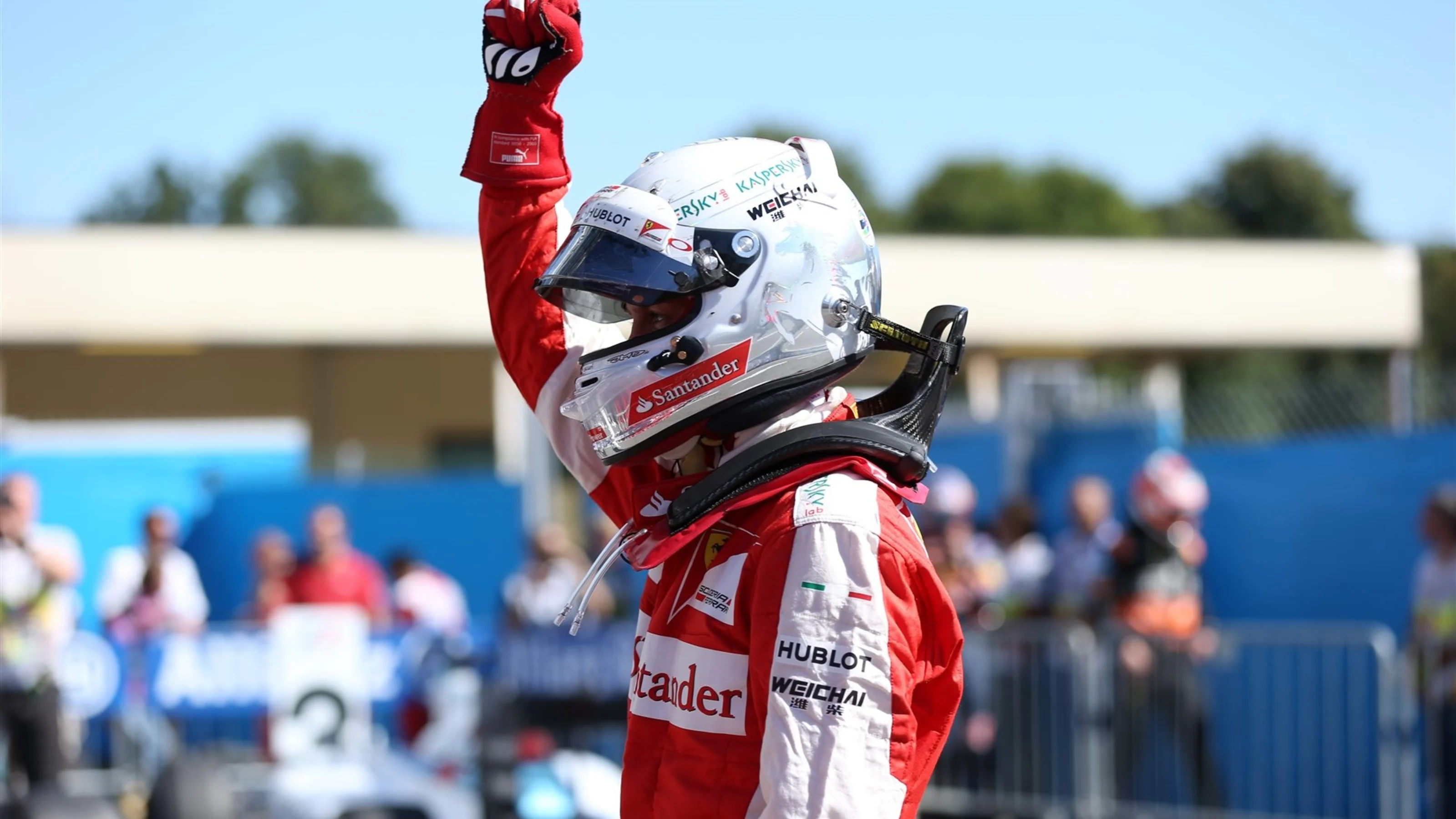 Sebastian Vettel (GER) Ferrari celebrates in parc ferme at Formula One World Championship, Rd12,