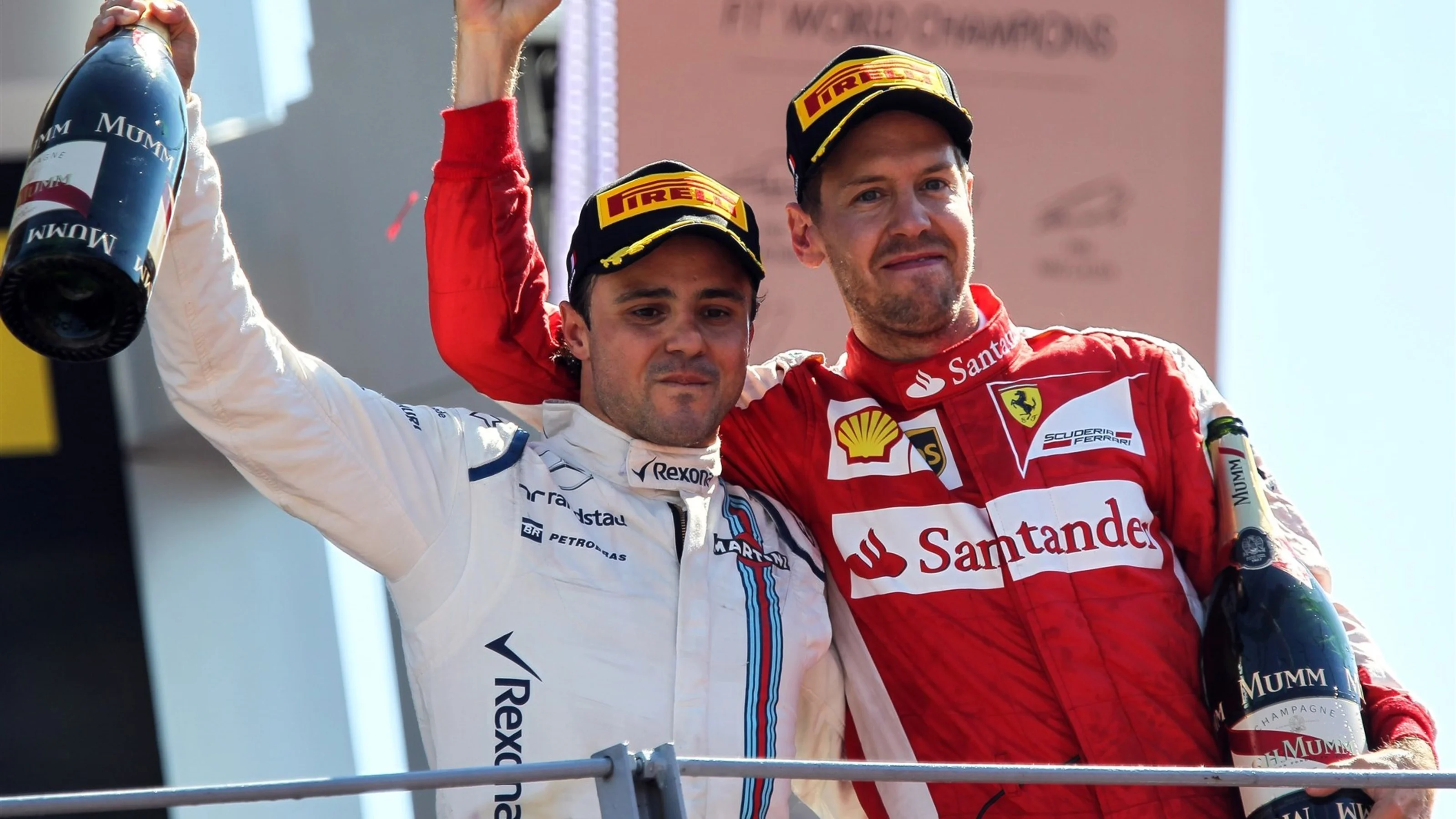 Felipe Massa (BRA) Williams and Sebastian Vettel (GER) Ferrari celebrate on the podium at Formula