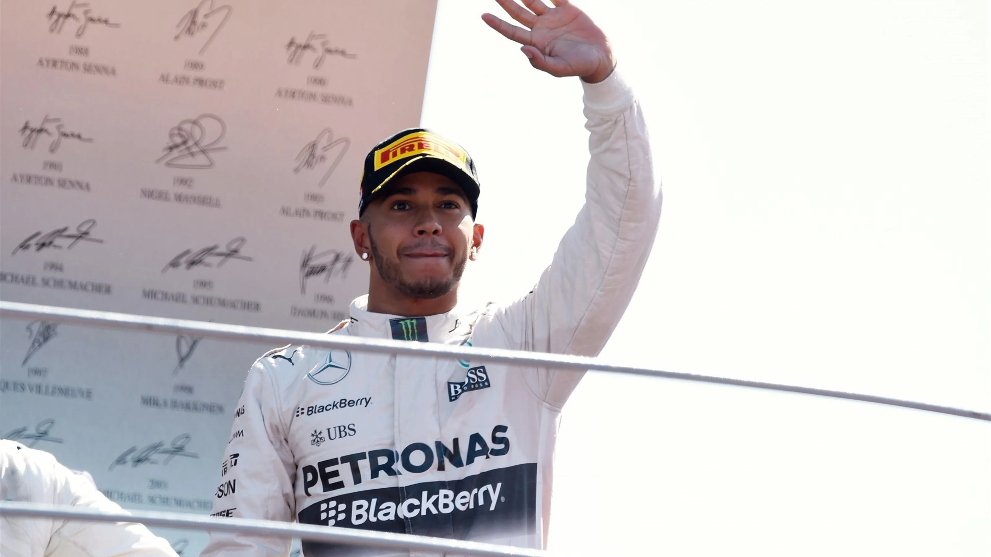 Race winner Lewis Hamilton (GBR) Mercedes AMG F1 celebrates on the podium at Formula One World