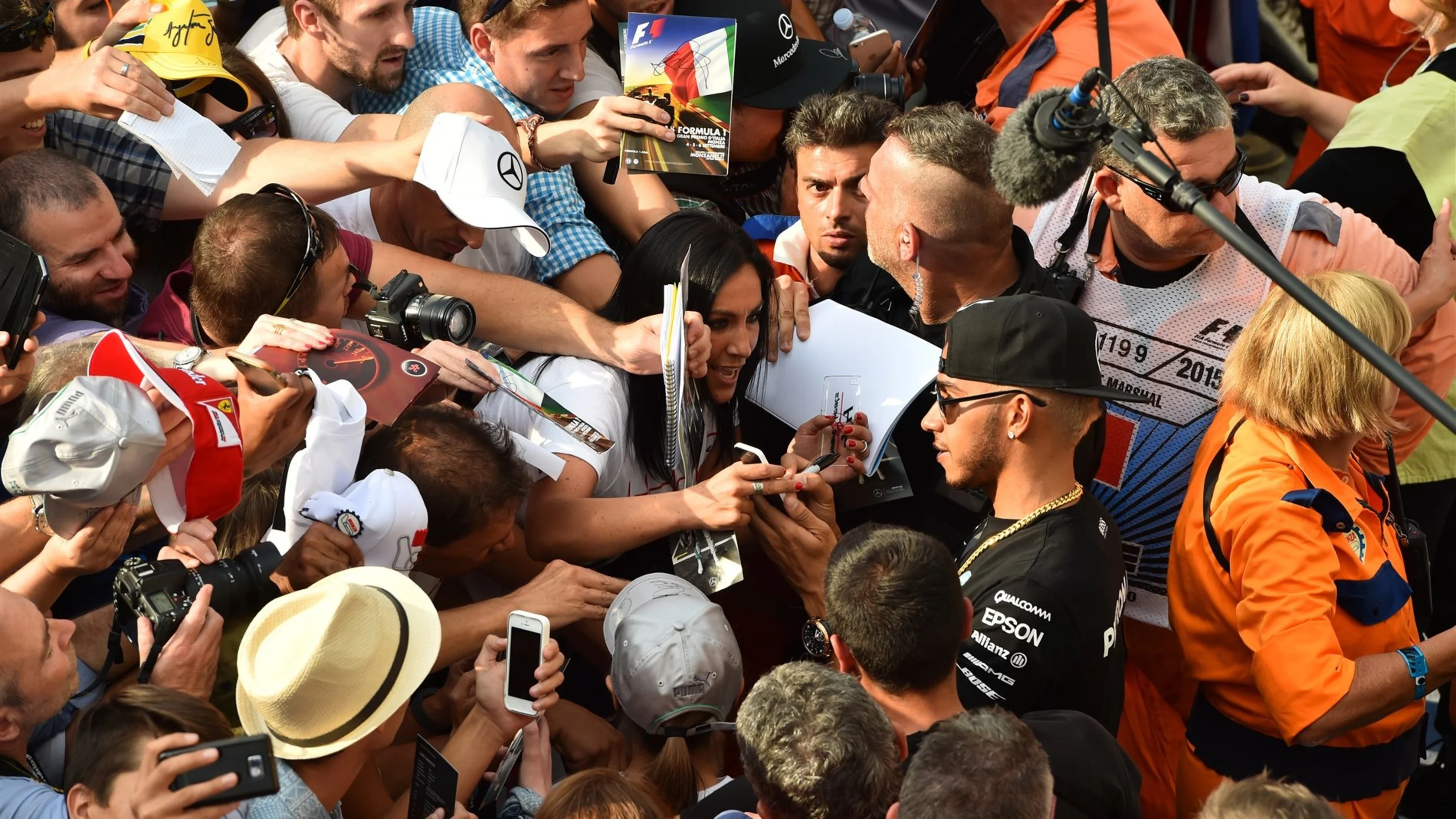 Lewis Hamilton (GBR) Mercedes AMG F1 signs autographs for the fans at Formula One World