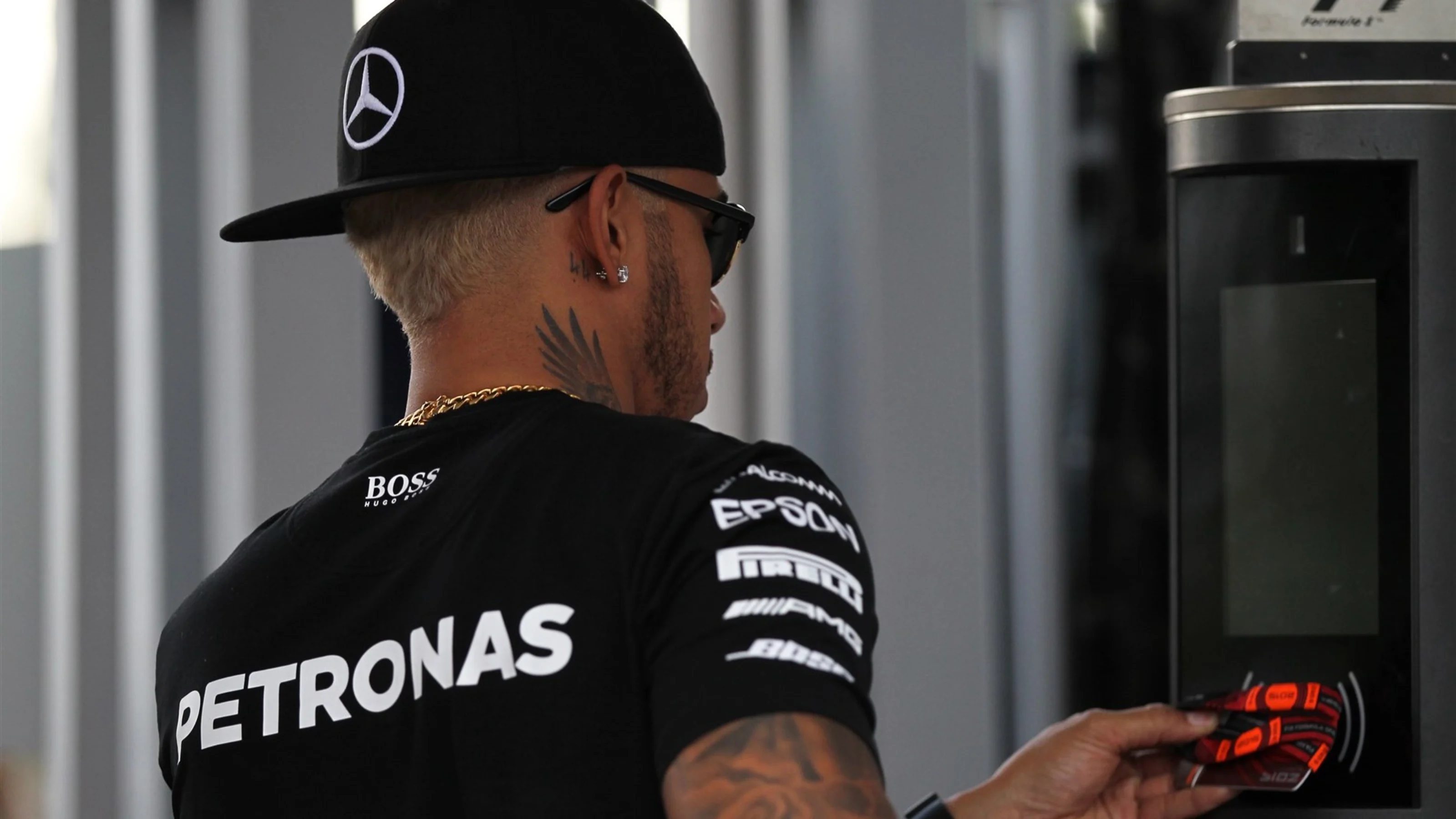 Lewis Hamilton (GBR) Mercedes AMG F1 with blonde hair and neck tattoo at Formula One World