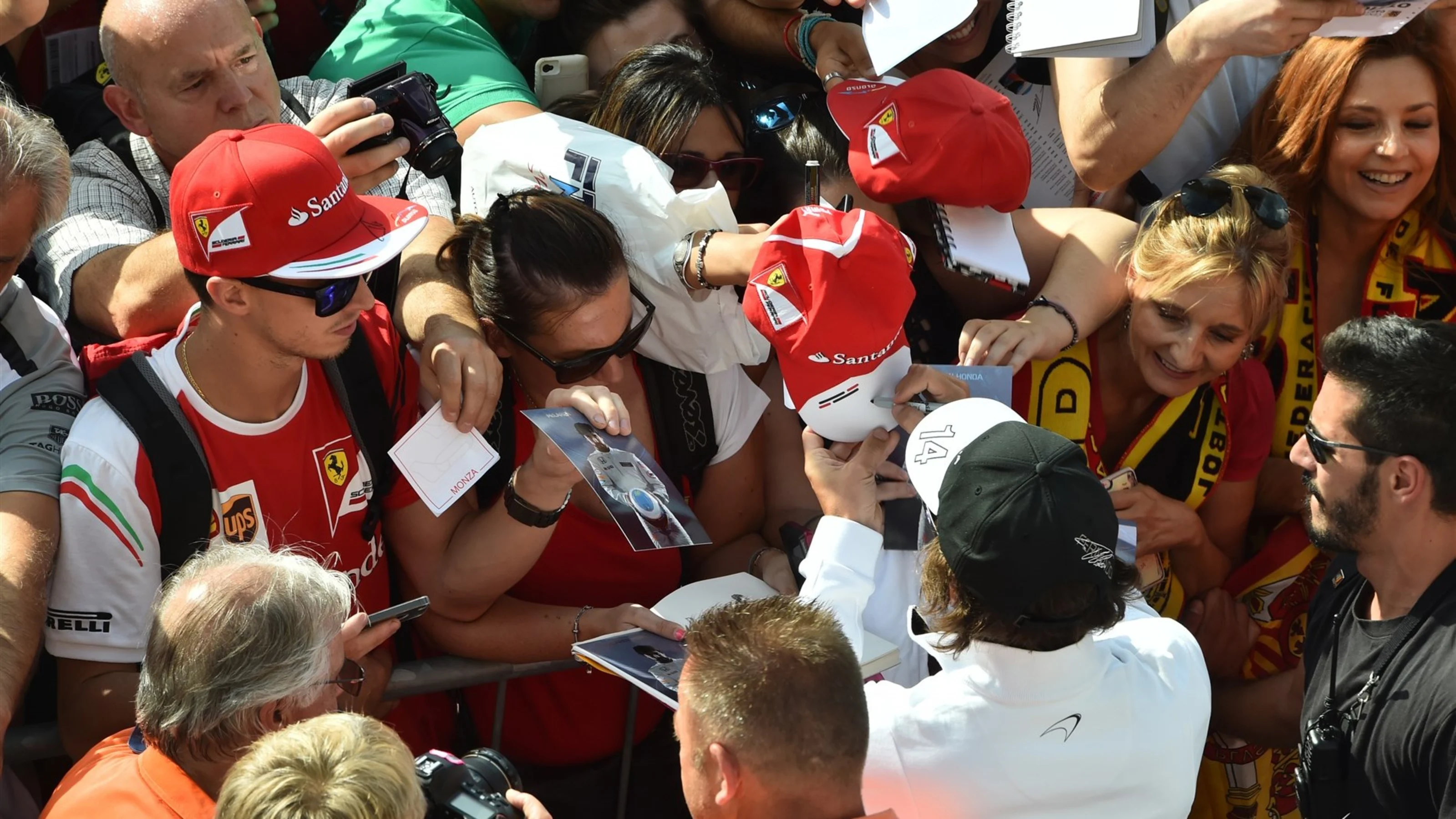 Fernando Alonso (ESP) McLaren signs autographs for the fans at Formula One World Championship,