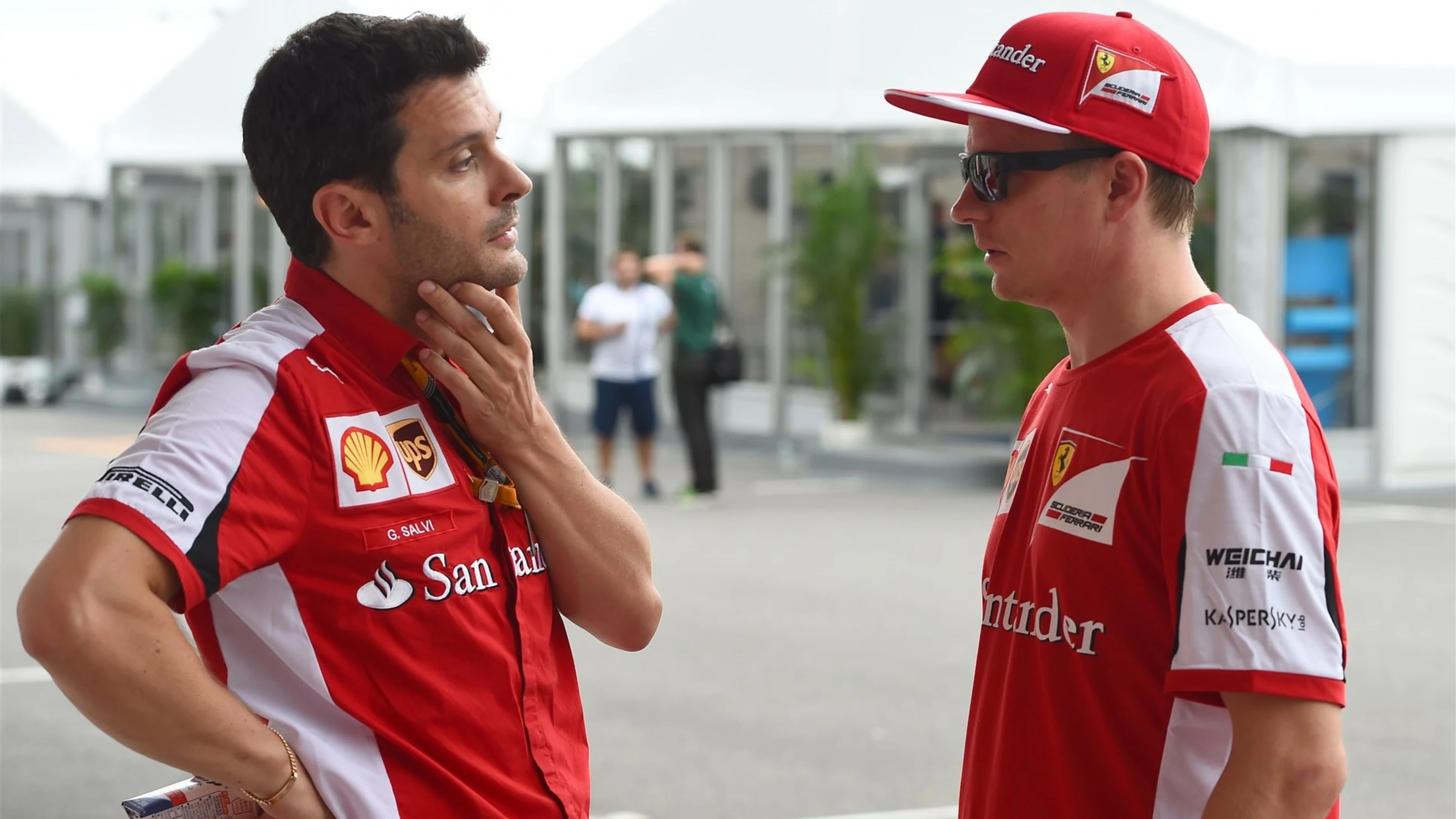 Kimi Raikkonen (FIN) Ferrari and G Salvi (ITA) Ferrari at Formula One World Championship, Rd14,