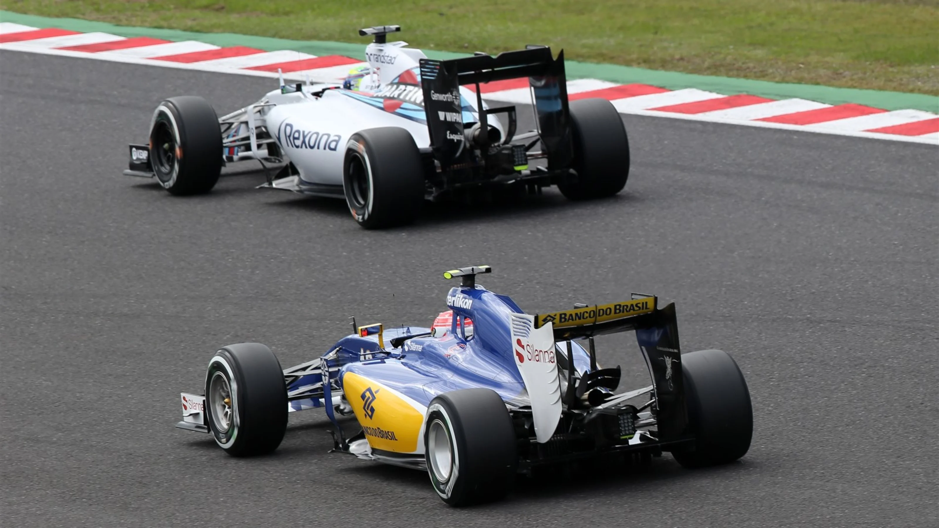 Felipe Nasr (BRA) Sauber C34 and Felipe Massa (BRA) Williams FW37 at Formula One World