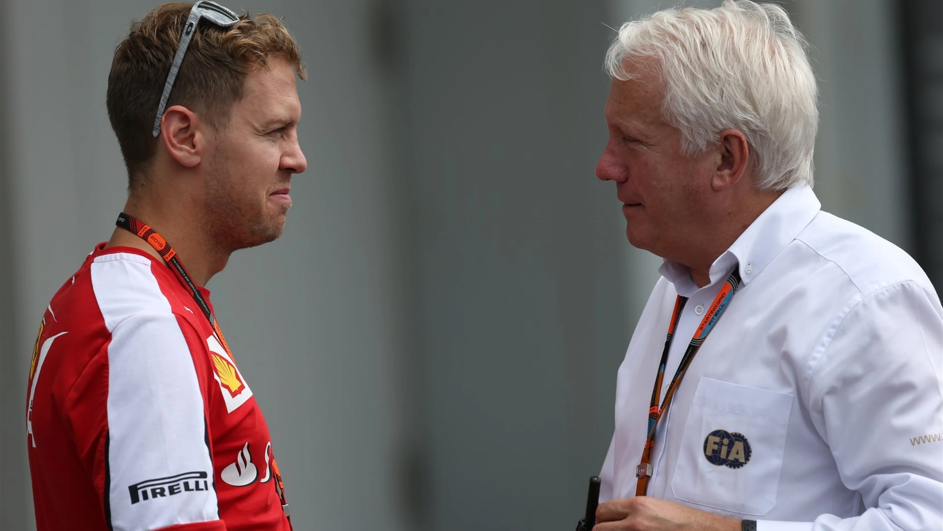 Sebastian Vettel (GER) Ferrari and Charlie Whiting (GBR) FIA Delegate at Formula One World