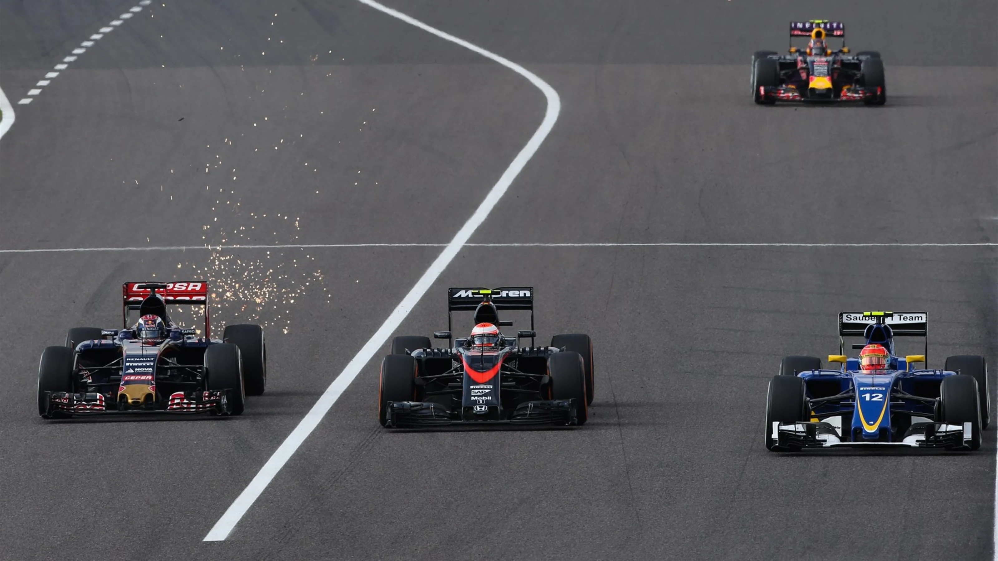 Max Verstappen (NDL) Scuderia Toro Rosso STR10, Jenson Button (GBR) McLaren MP4-30 and Felipe Nasr