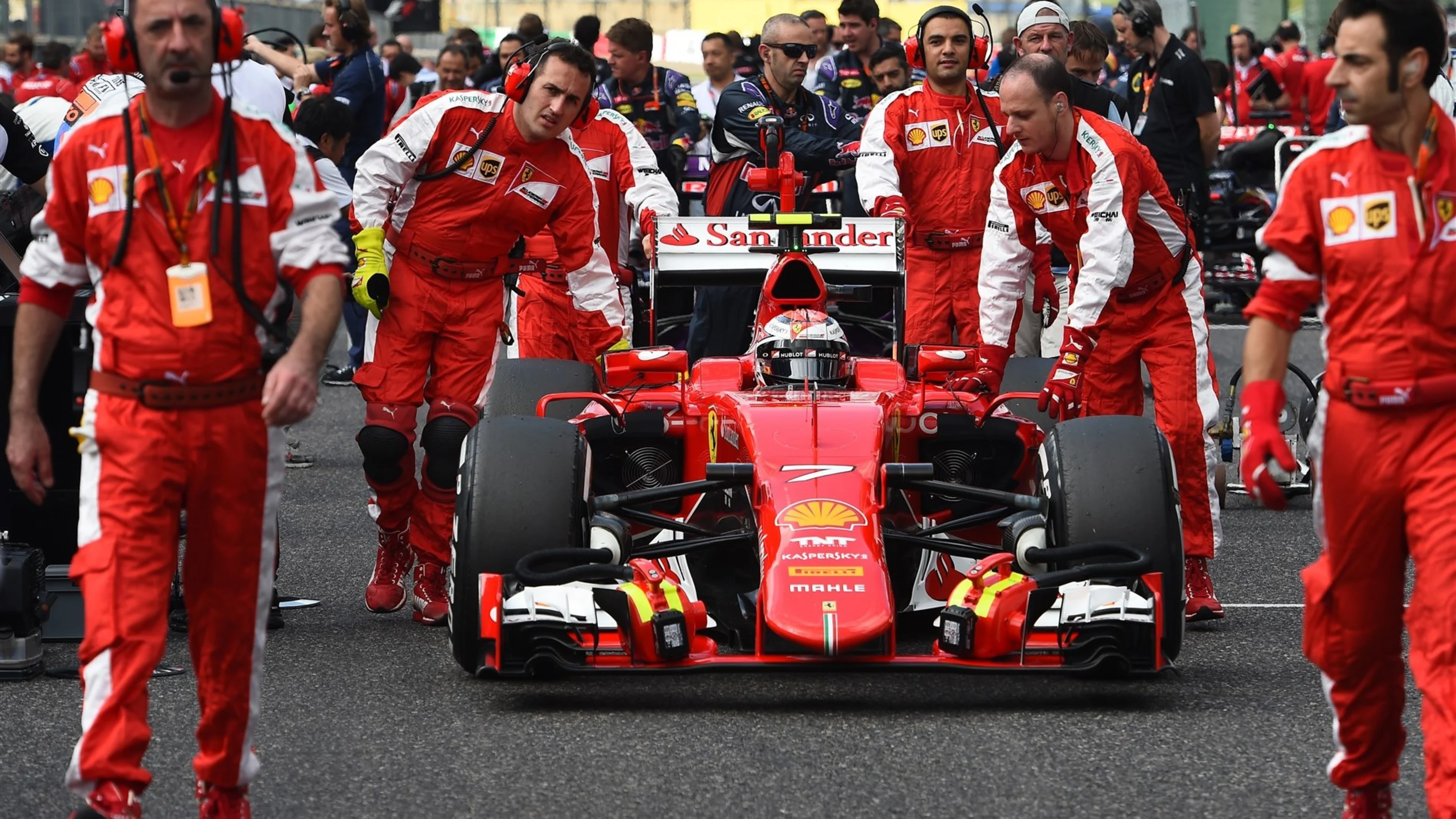 Kimi Raikkonen (FIN) Ferrari SF15-T on the grid at Formula One World Championship, Rd14, Japanese