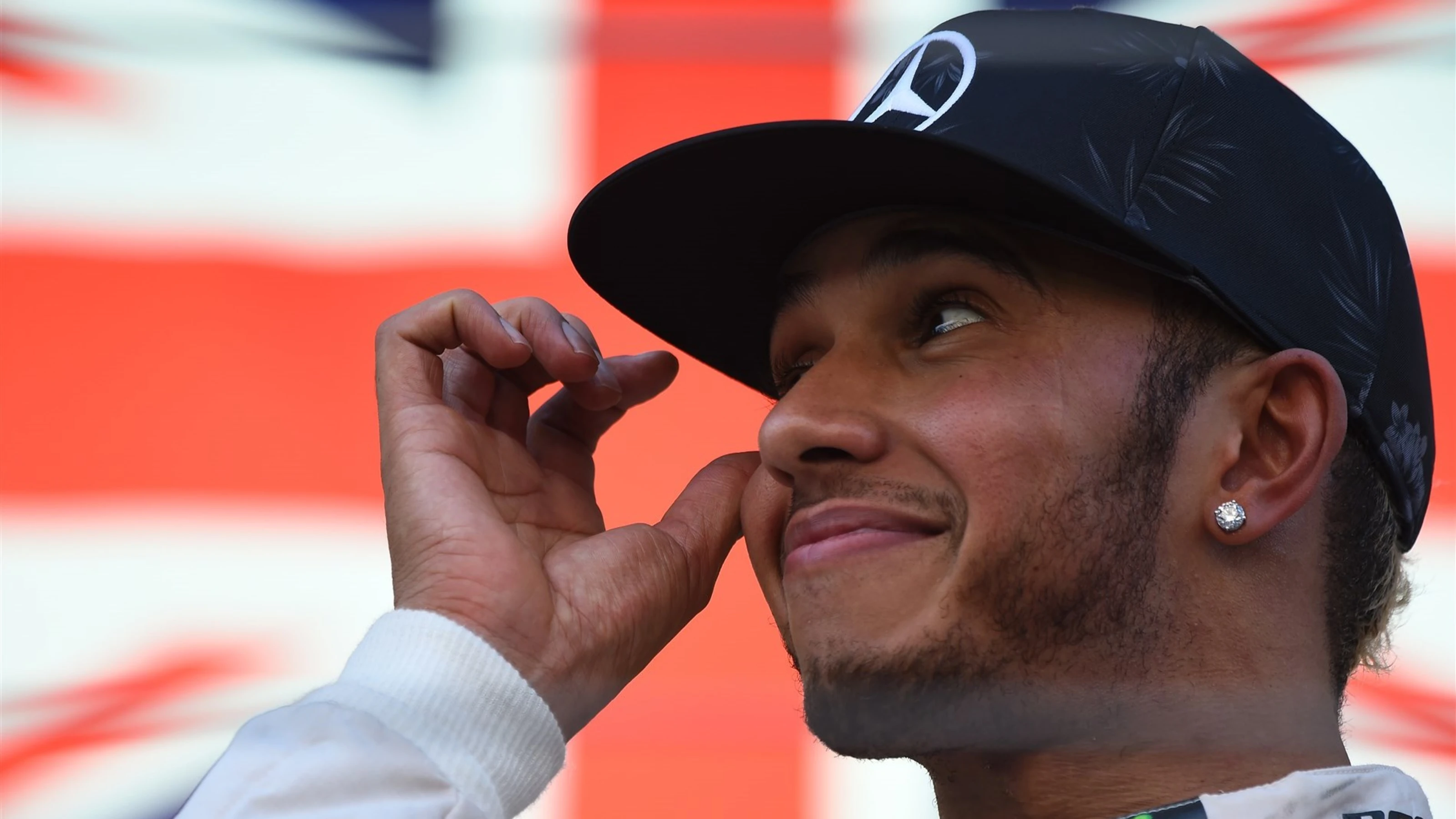Race winner Lewis Hamilton (GBR) Mercedes AMG F1 celebrates on the podium at Formula One World