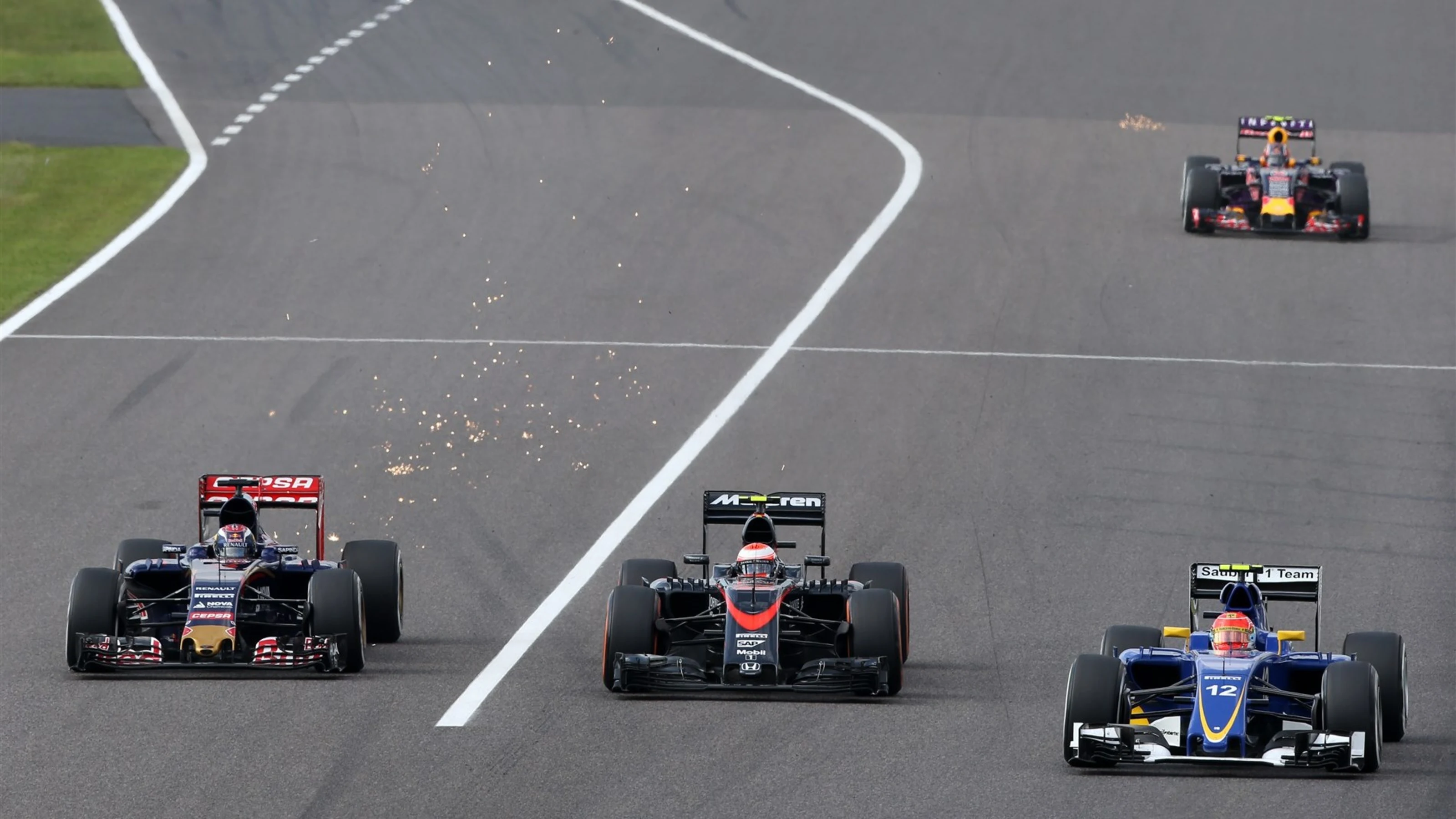 Max Verstappen (NDL) Scuderia Toro Rosso STR10, Jenson Button (GBR) McLaren MP4-30 and Felipe Nasr