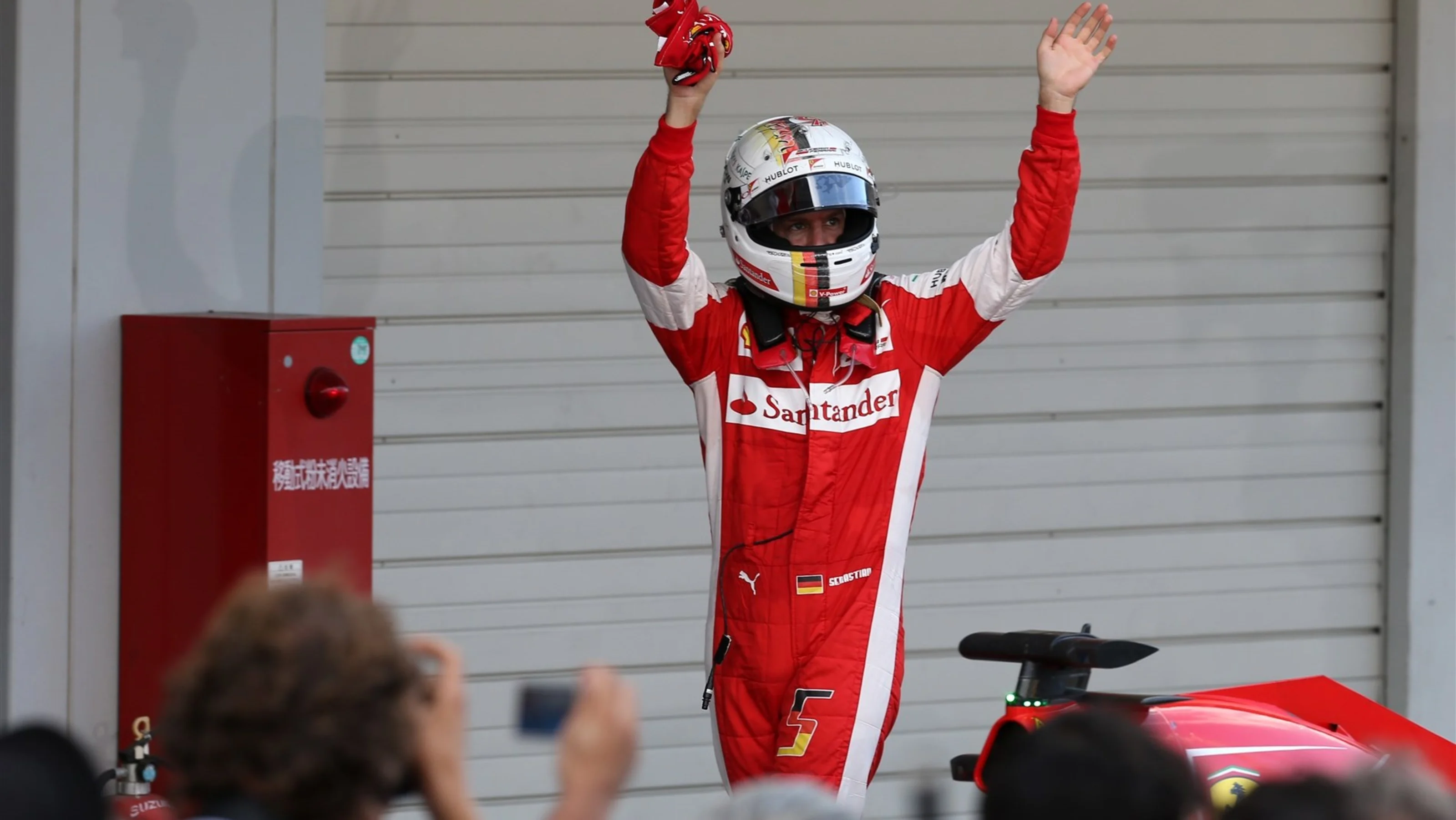 Sebastian Vettel (GER) Ferrari celebrates in parc ferme at Formula One World Championship, Rd14,
