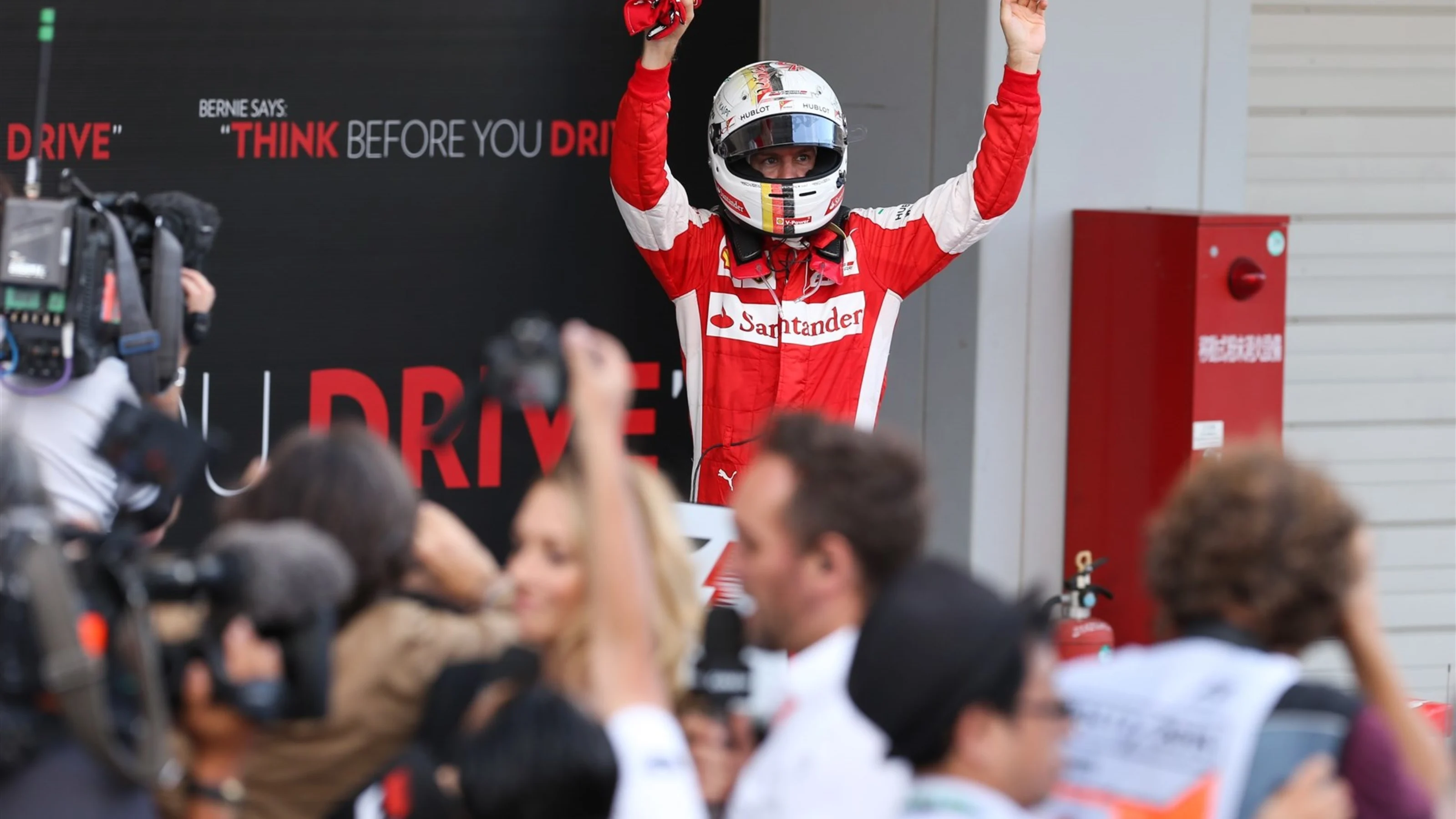 Sebastian Vettel (GER) Ferrari celebrates in parc ferme at Formula One World Championship, Rd14,