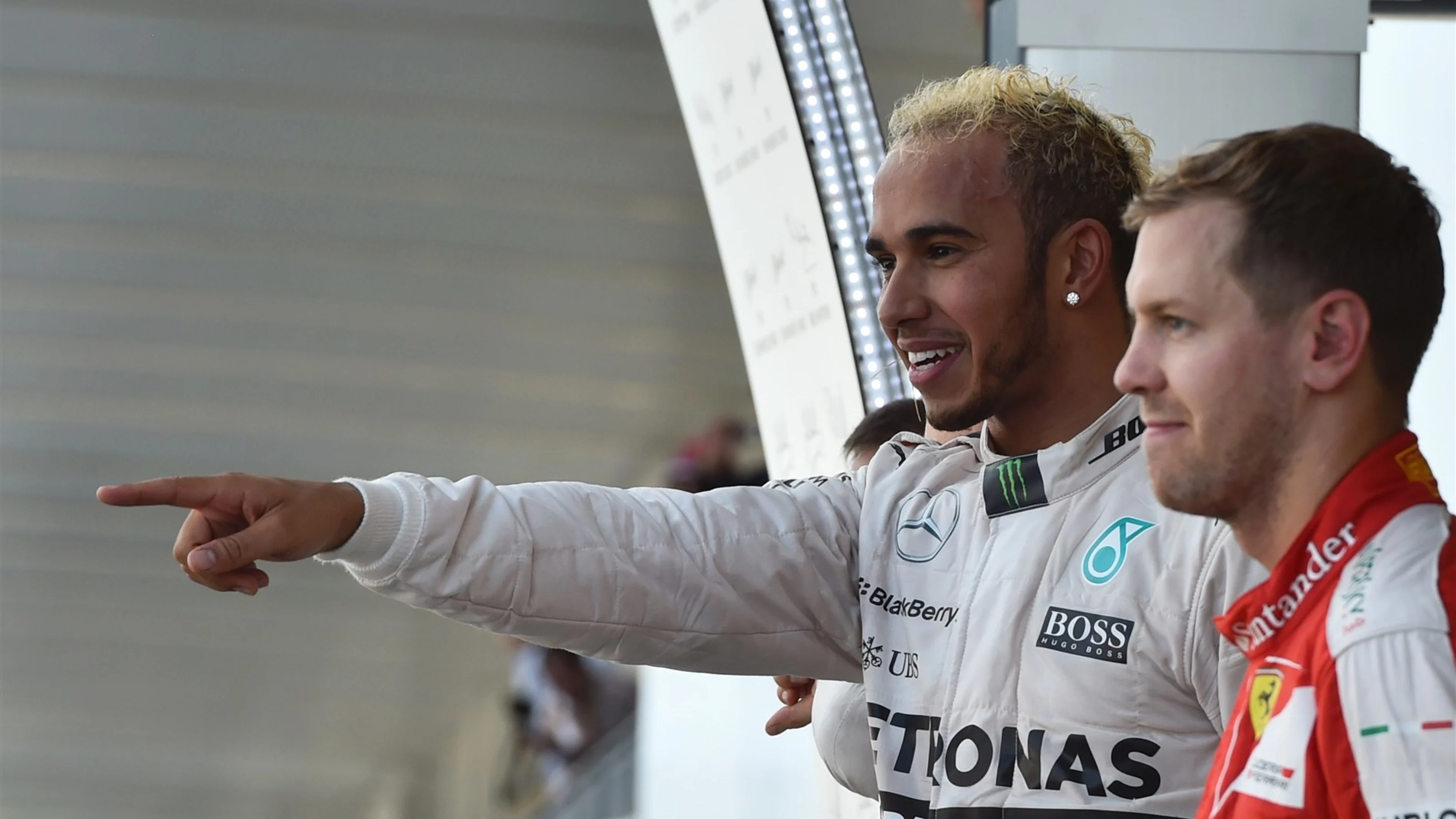 Lewis Hamilton (GBR) Mercedes AMG F1 and Sebastian Vettel (GER) Ferrari celebrate on the podium at