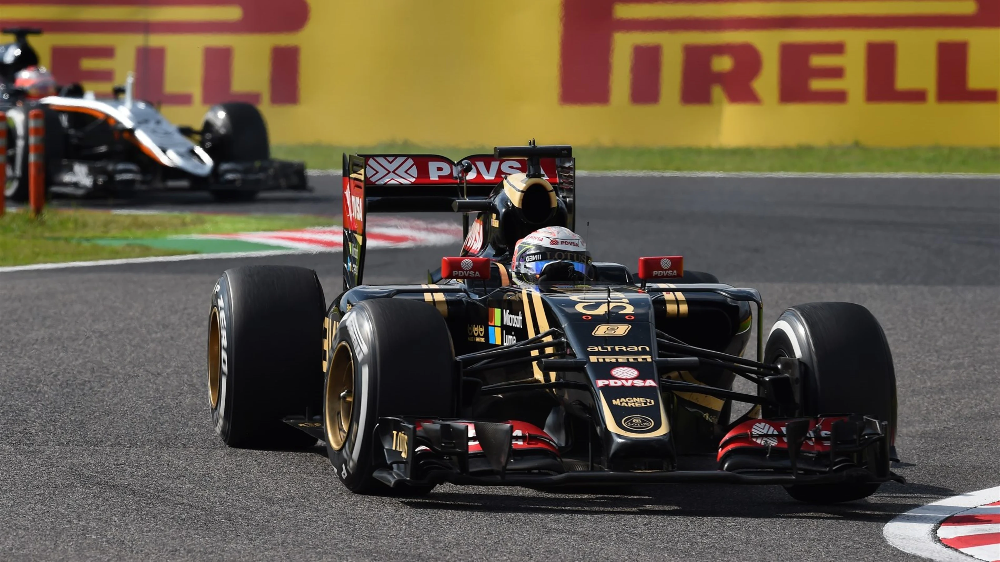 Romain Grosjean (FRA) Lotus E23 Hybrid at Formula One World Championship, Rd14, Japanese Grand
